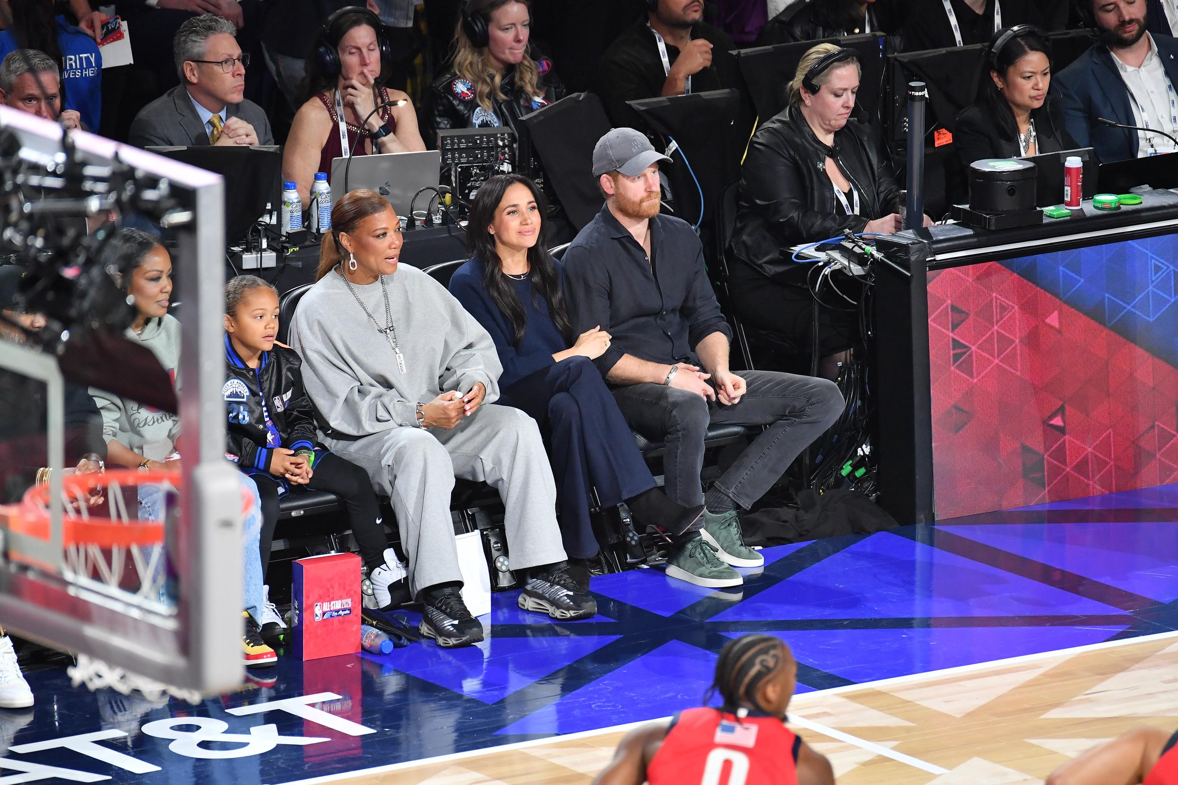 Queen Latifah, Meghan Markle, Duchess of Sussex, and Prince Harry, Duke of Sussex, at the 75th NBA All-Star Game on February 15, 2026, in California, United States. | Source: Getty Images