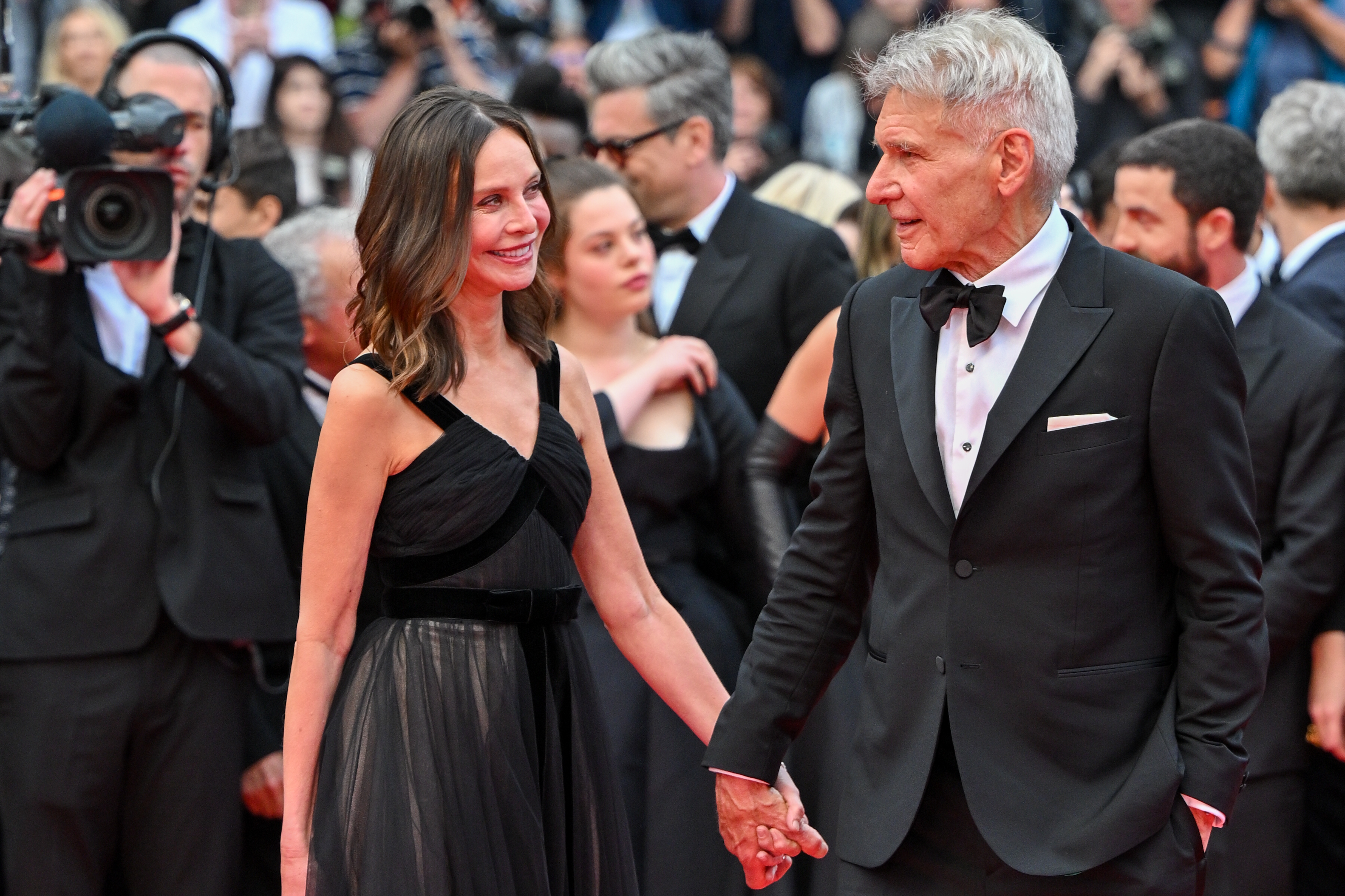 Harrison Ford, Calista Flockhart at the "Indiana Jones And The Dial Of Destiny" red carpet during the 76th annual Cannes film festival on May 18, 2023 | Source: Getty Images