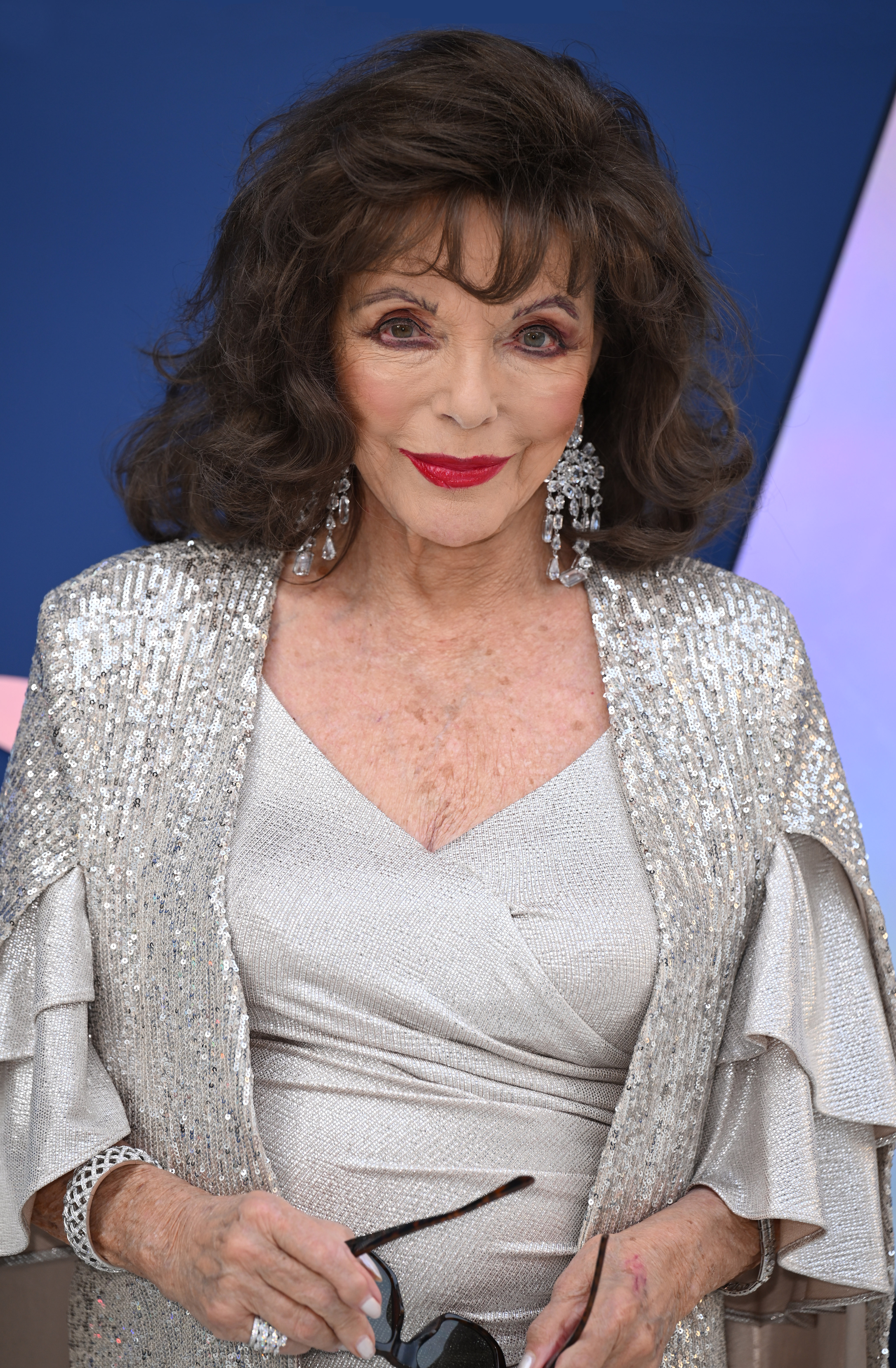 Joan Collins graced the V&A 2023 Summer Party at The V&A in London, England, with her elegant presence. | Source: Getty Images