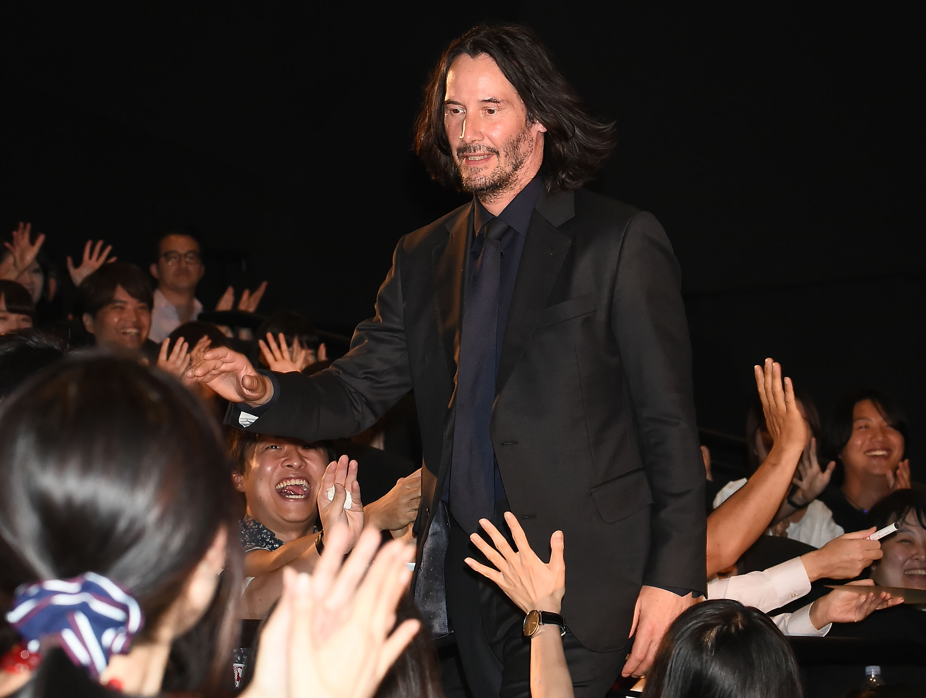 Keanu Reeves attends the stage greeting for 'John Wick: Chapter 3 - Parabellum' Japan premiere at Roppongi Hills in Tokyo, Japan, on September 10, 2019. | Source: Getty Images