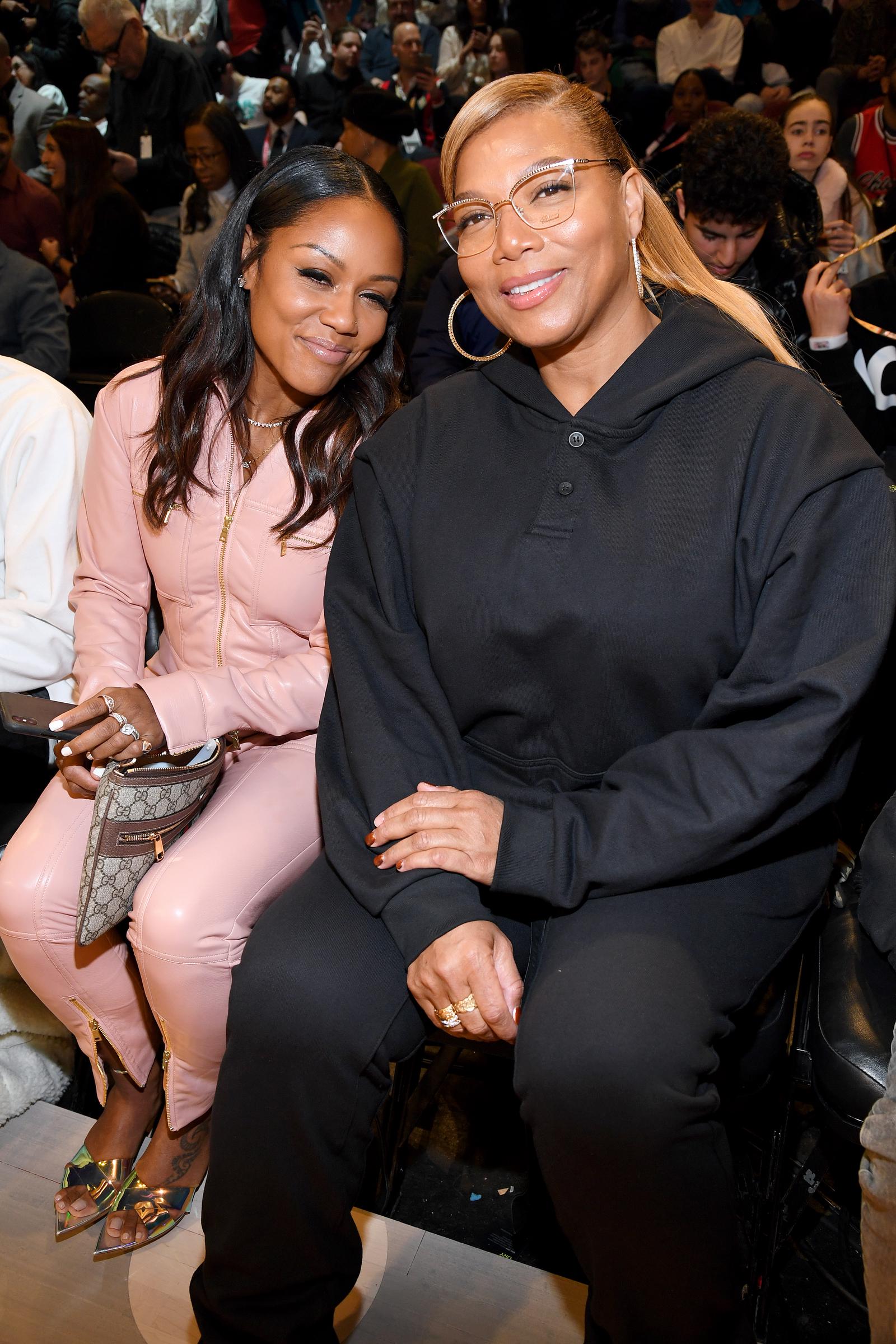 Eboni Nichols (L) and Queen Latifah attend the 69th NBA All-Star Game at United Center in Chicago, Illinois on February 16, 2020. | Source: Getty Images