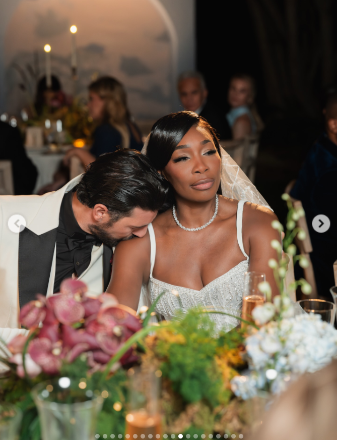 Andrea Preti kisses his bride Venus Williams's shoulder at their wedding, seen from a post dated December 24, 2025. | Source: Instagram/andreapreti88