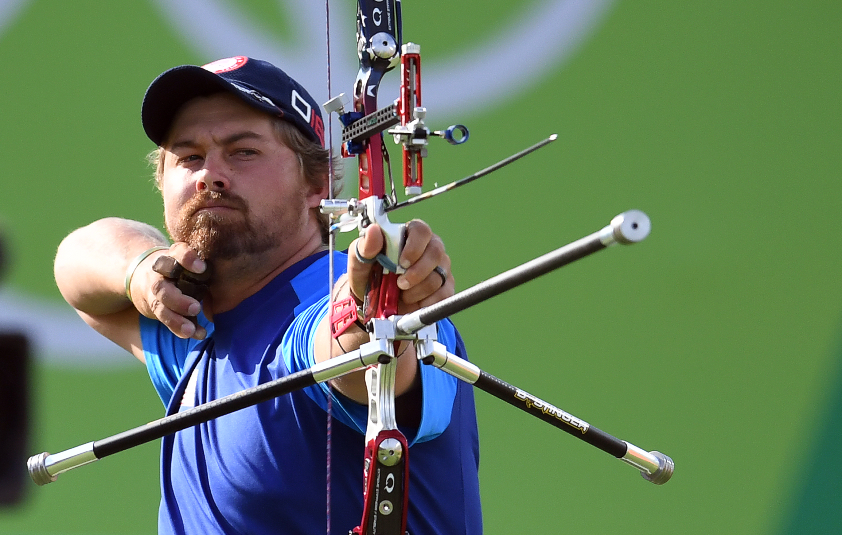 Brady Ellison of the US shoots an arrow during the Rio 2016 Olympic Games Men's Team semifinal match at the Sambodromo archery venue in Rio de Janeiro, Brazil on August 6, 2016 | Source: Getty Images