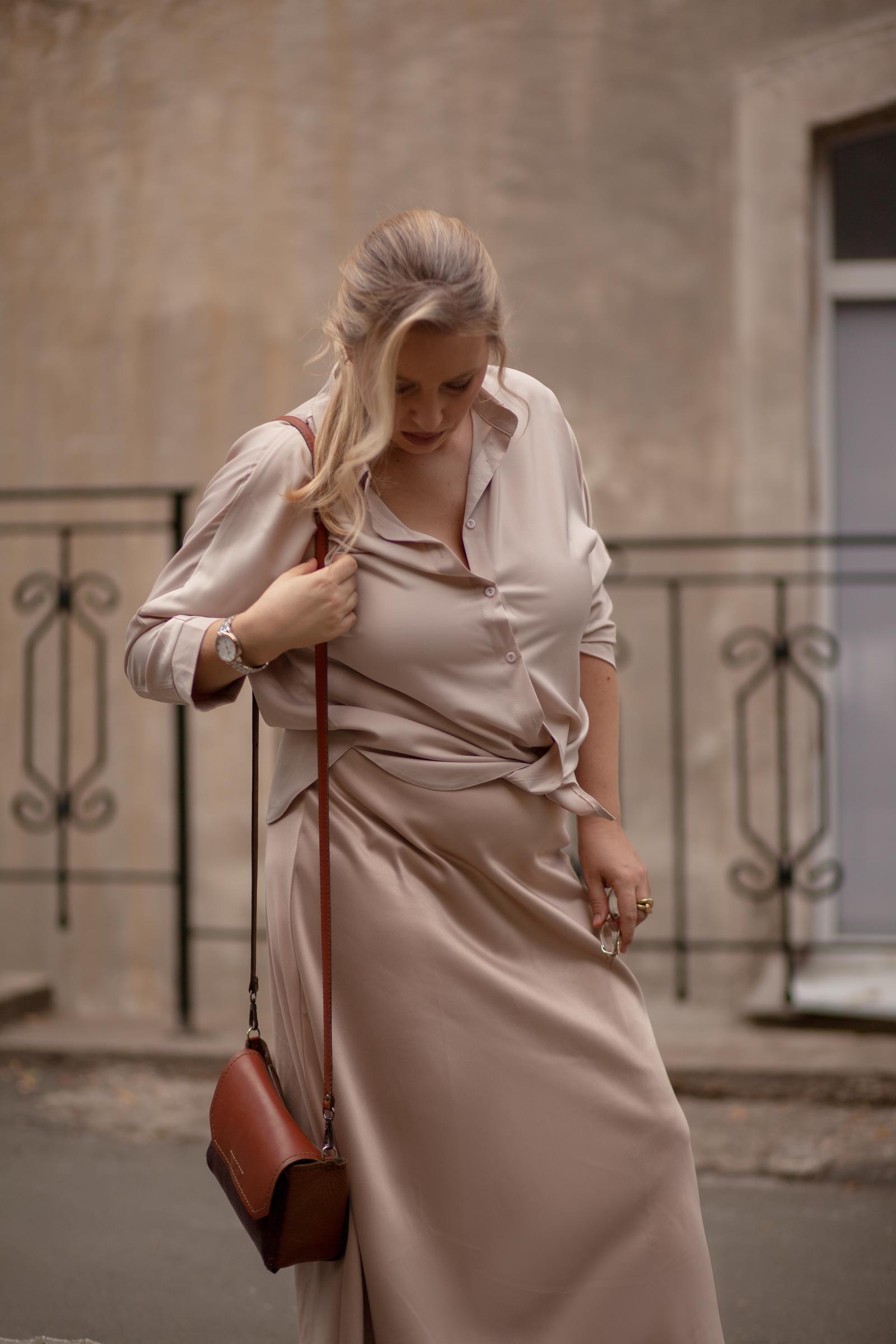 Woman wearing a silk A-Line skirt | Source: Shutterstock