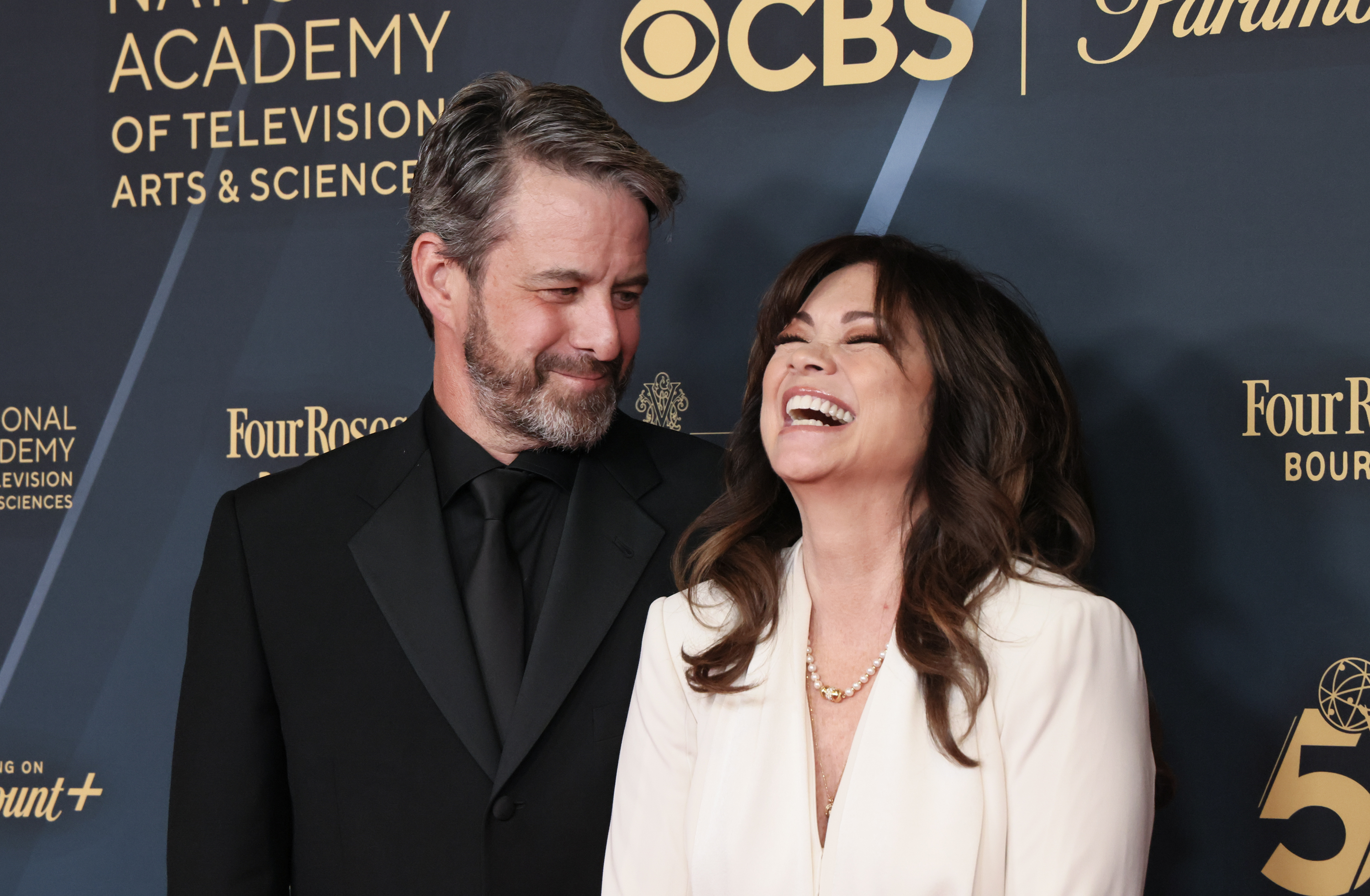 Mike Goodnough gazes at a joyful Valerie Bertinelli at the 51st annual Daytime Emmys Awards in Los Angeles, California, on June 7, 2024. | Source: Getty Images