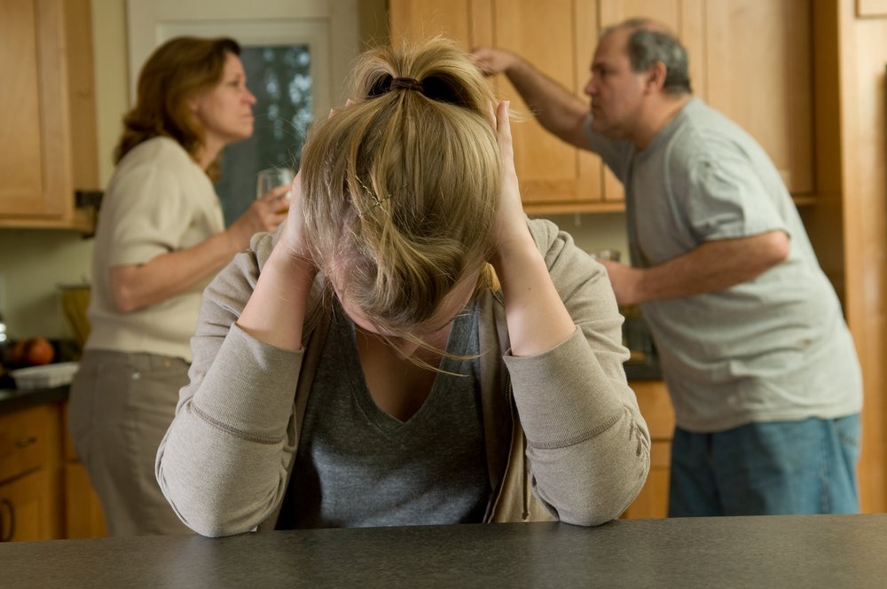 Family members arguing and yelling at each other. | Photo: Shutterstock.