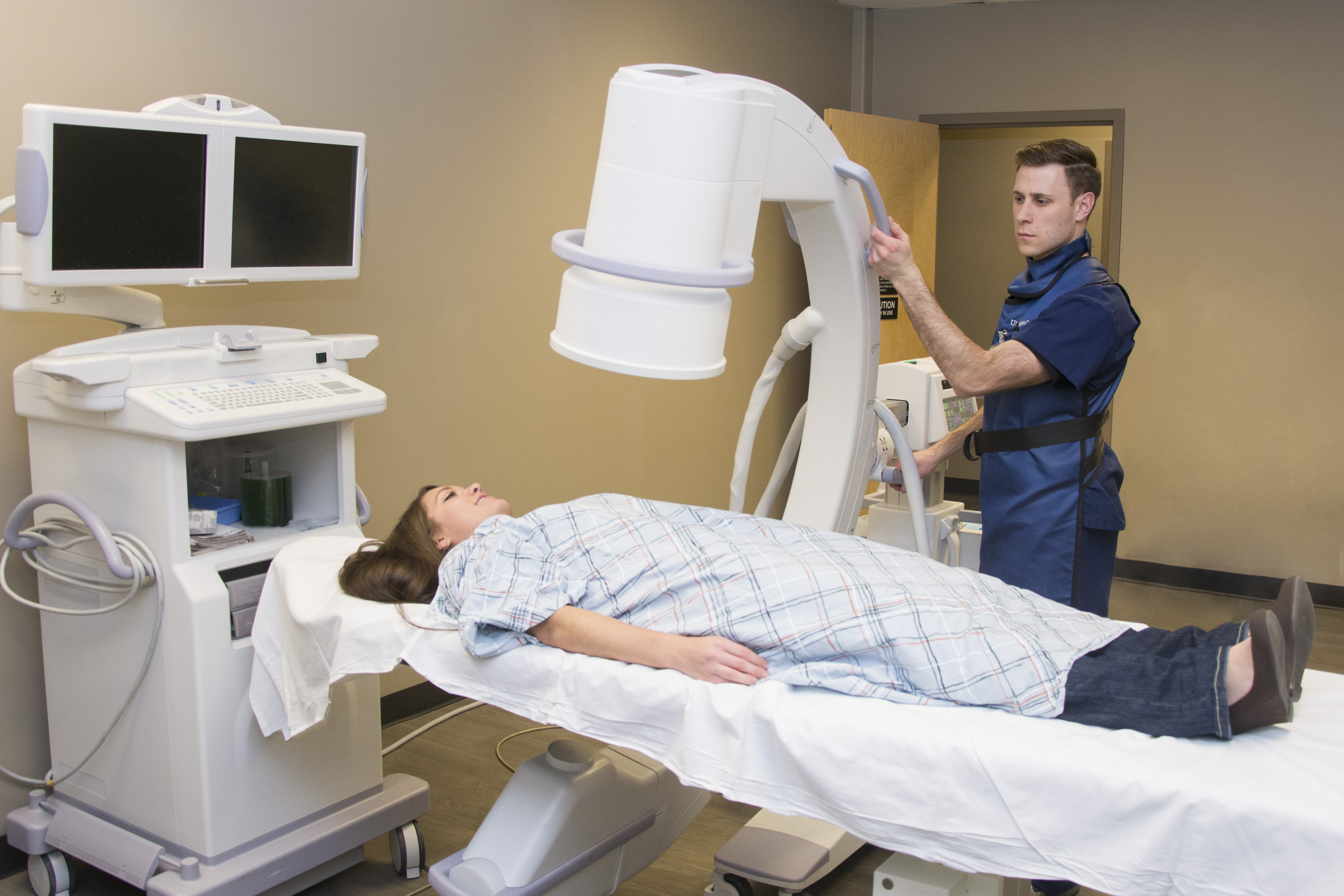 A patient preparing a patient for an X-ray. | Source: Shutterstock