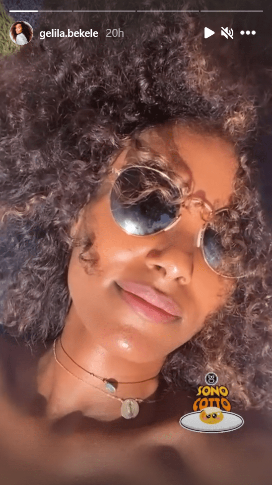 Gelila Bekele shares her sun-kissed face with a dark shade on in an IG post. | Photo: Instagram/Gelila.bekele