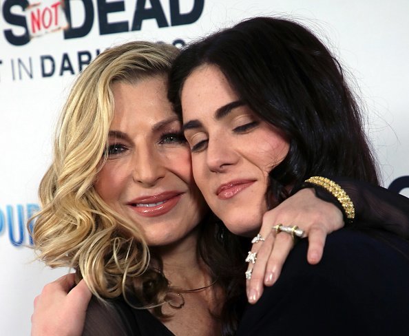 Tatum O'Neal (L) and daughter Emily McEnroe attend the "God's Not Dead: A Light in Darkness" premiere at American Cinematheque's Egyptian Theatre on March 20, 2018 | Photo: Getty Images