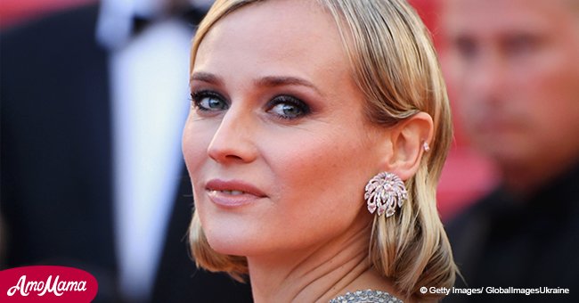 Diane Kruger shows off toned body in a jewel-encrusted plum gown at the red carpet