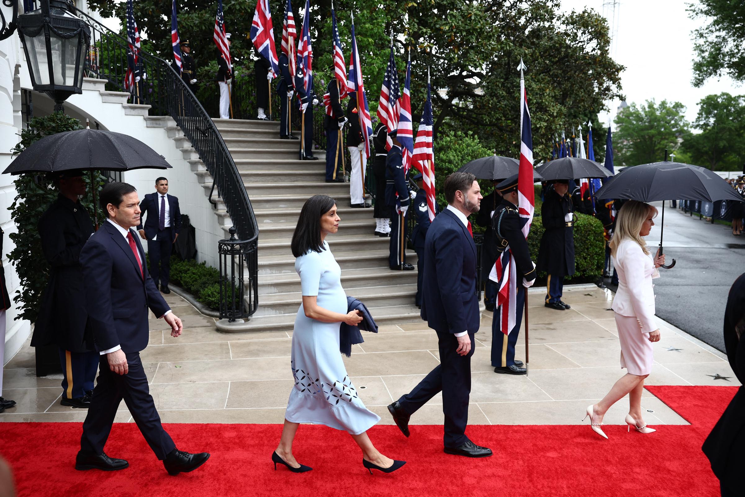 Usha Vance and her husband JD Vance arrive ahead of Donald Trump, Melania Trump, King Charles III, and Queen Camilla during an arrival ceremony on the White House South Lawn, April 28, 2026. | Source: Getty Images