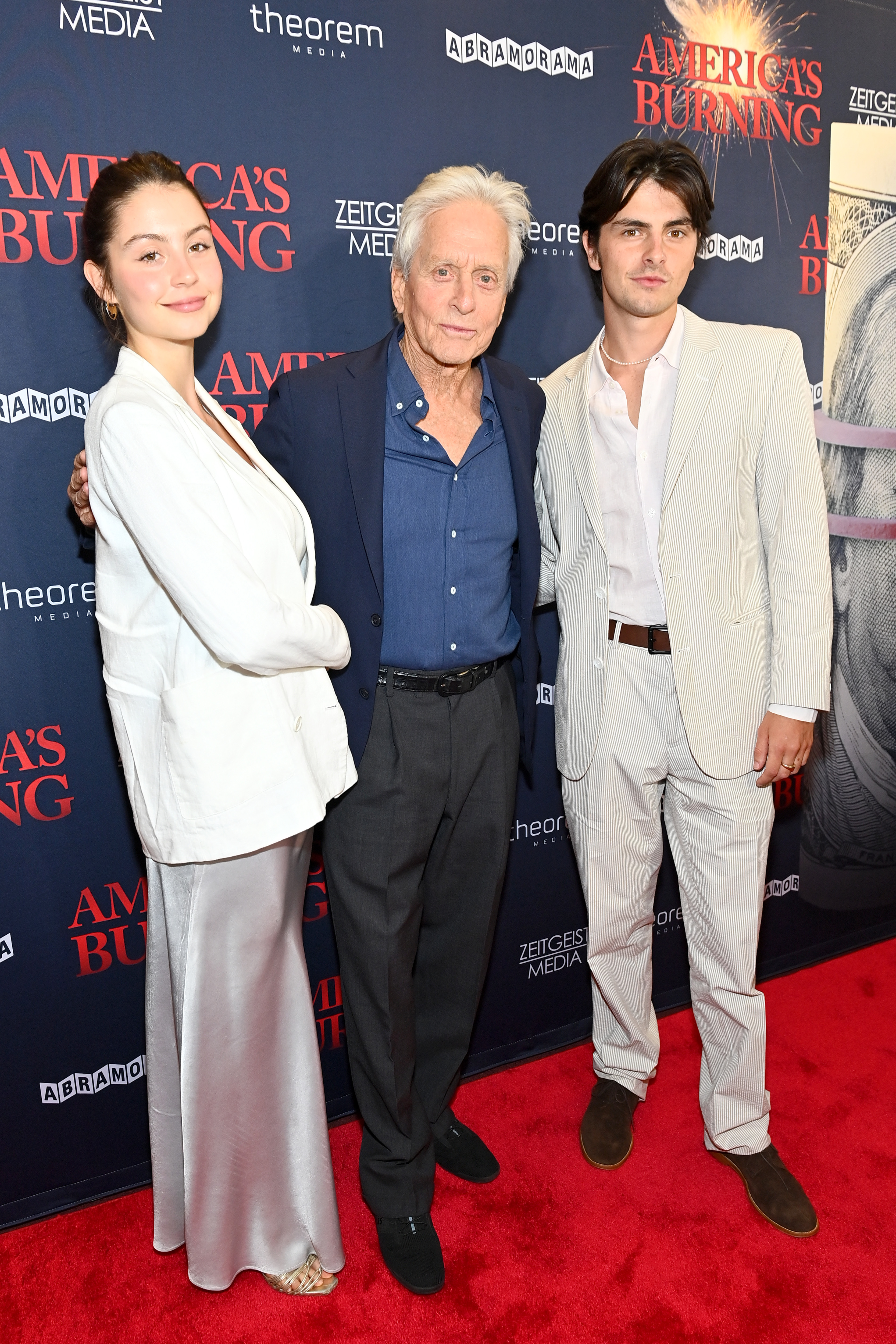 Michael Douglas and his children, Carys and Dylan Douglas, attend the "America's Burning" New York screening at DGA Theater on July 10, 2024. | Source: Getty Images