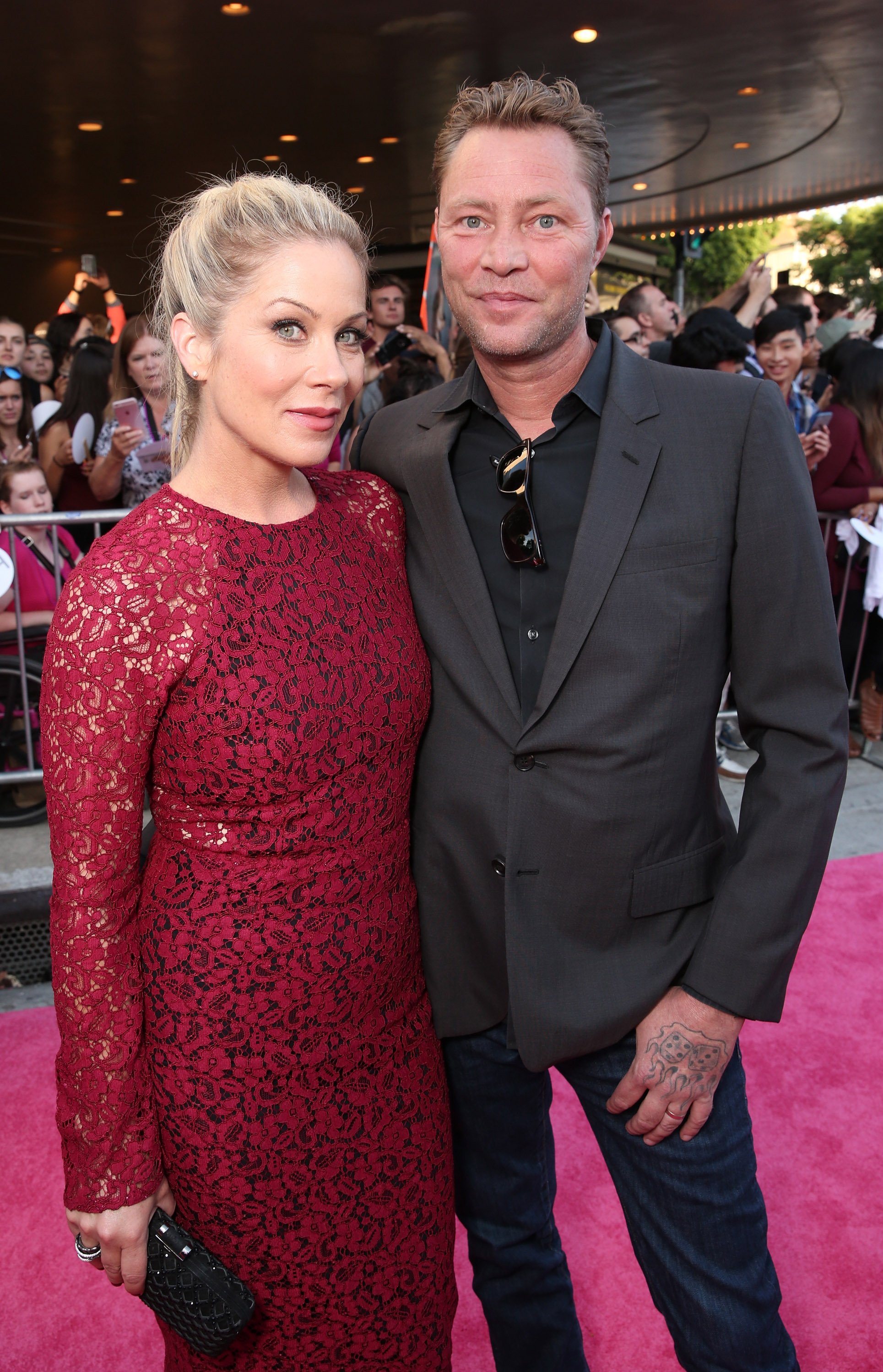  Christina Applegate and Martyn LeNoble at Mann Village Theatre on July 26, 2016 | Source: Getty Images