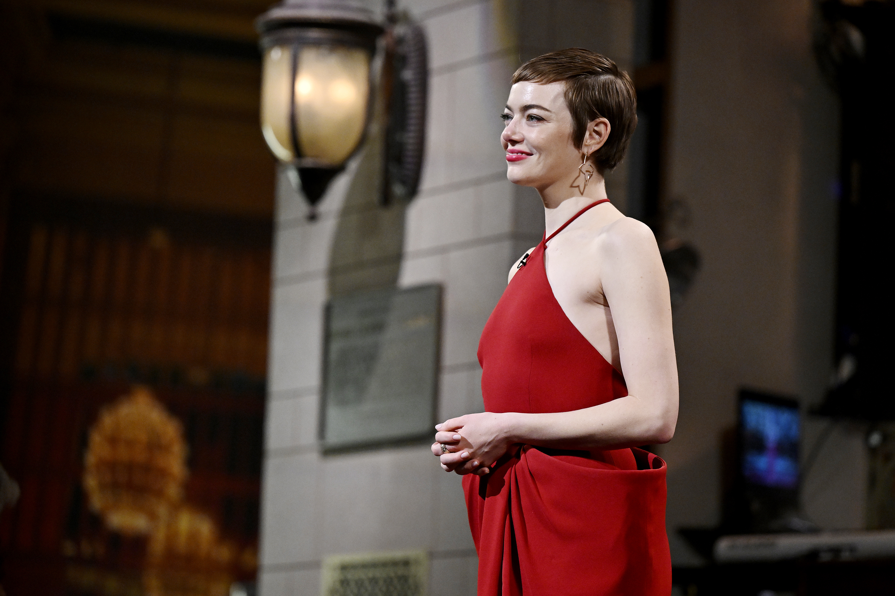 Emma Stone during the "Intro Physical Comedy" sketch at "SNL50: The Anniversary Special" on February 16, 2025, in New York City. | Source: Getty Images