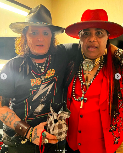 Johnny Depp and Micki Free posing for a picture posted on November 5, 2022 | Source: Instagram/official_micki_free