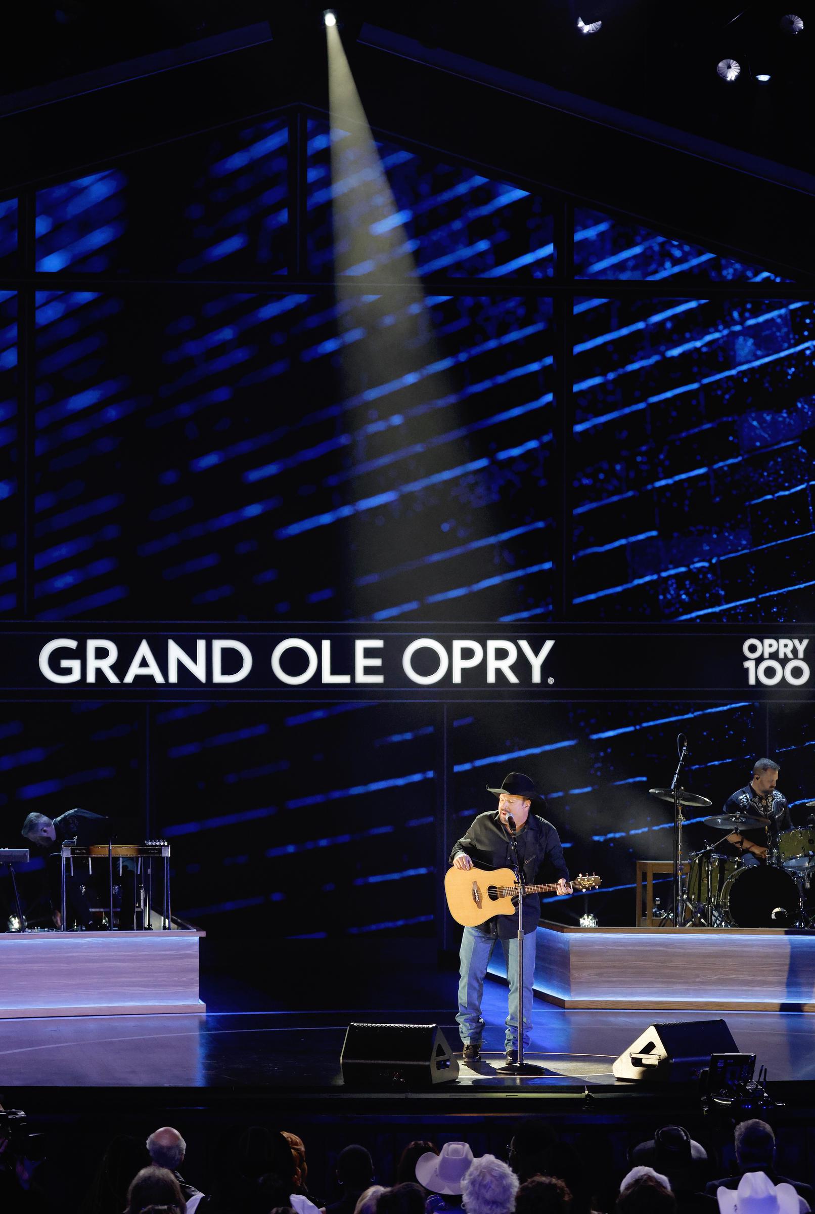 Garth Brooks singing solo at the Grand Ole Opry Celebration. | Source: Getty Images