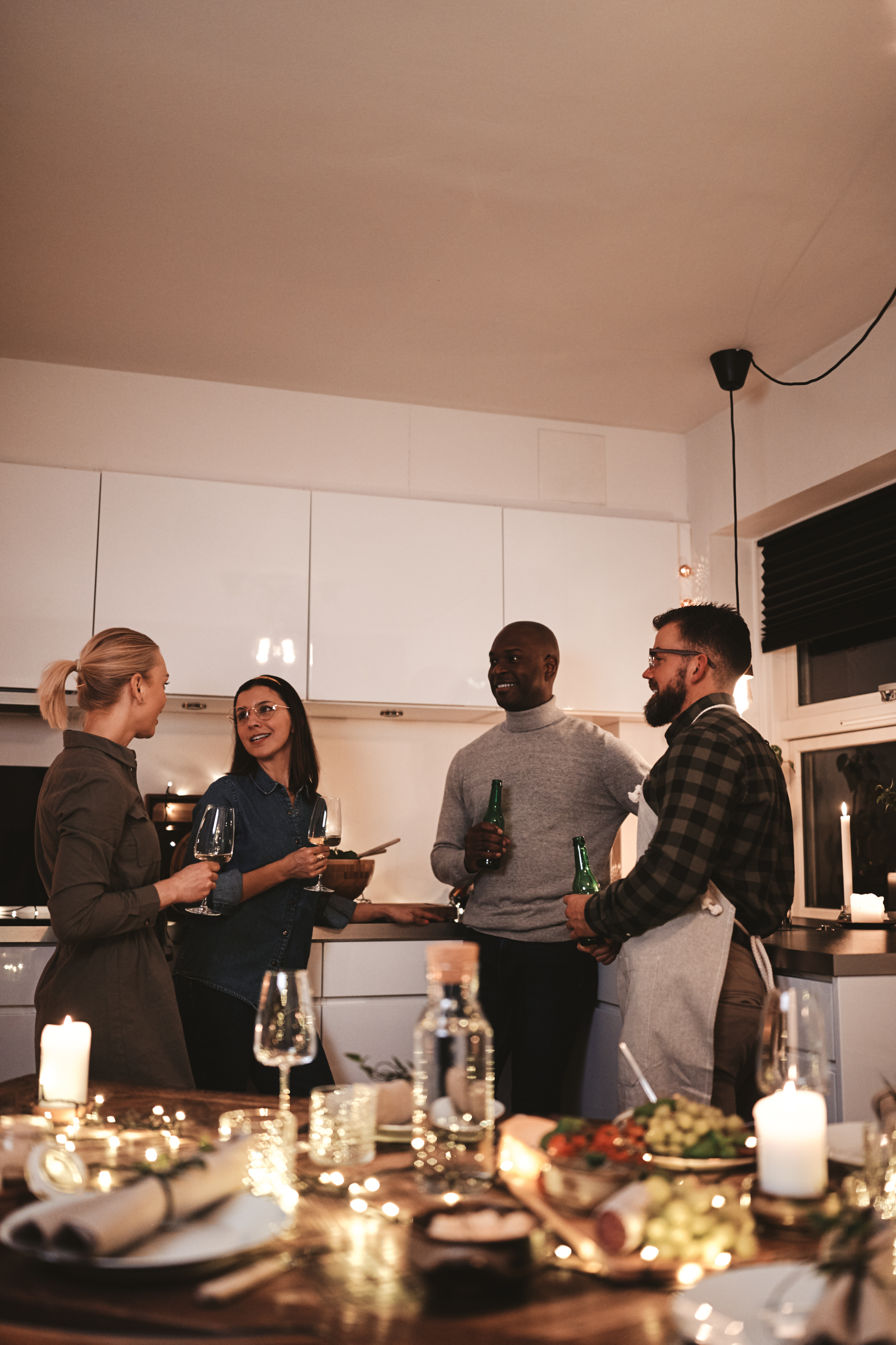 A group of people in the kitchen | Source: Shutterstock