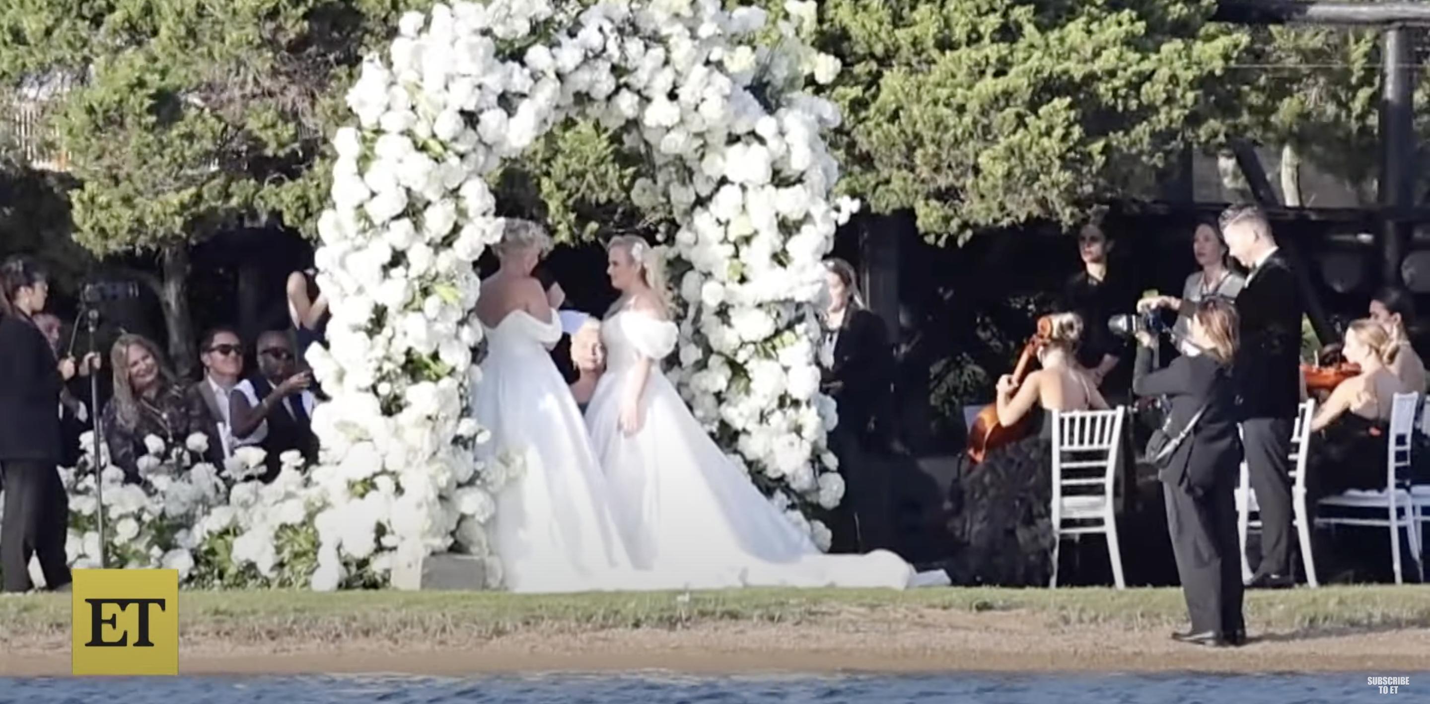 Rebel Wilson and Ramona Agruma exchanging vows on their wedding day posted on October 1, 2024 | Source: YouTube/@EntertainmentTonight