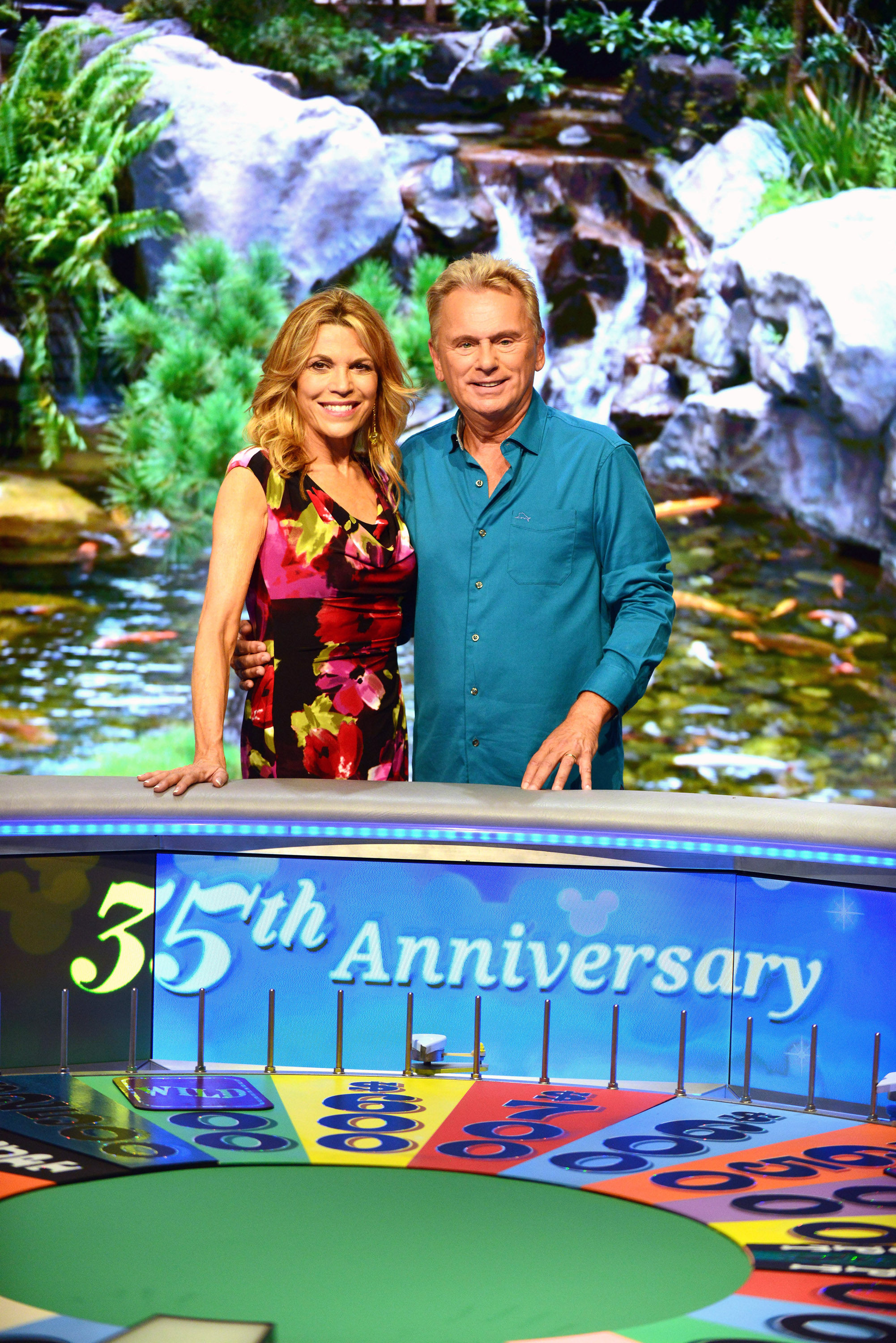 Vanna White and Pat Sajak during taping of the 35th Anniversary Season of the "Wheel of Fortune" at the Walt Disney World in Orlando, Florida on October 10, 2017 | Source: Getty Images