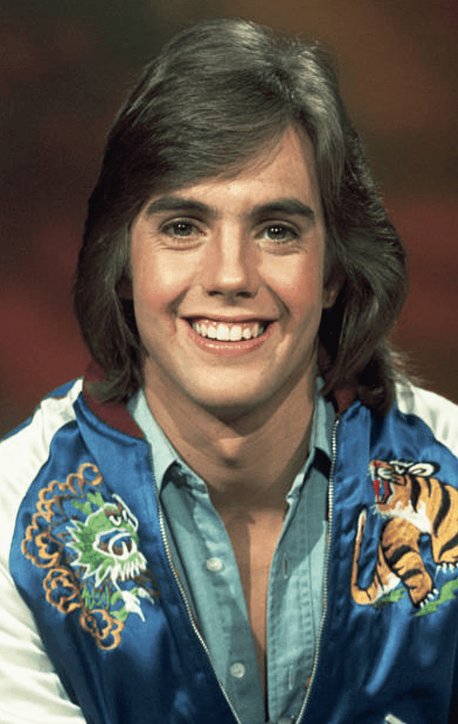 Shaun Cassidy poses for a picture while filming a commercial for National Foundation March of Dimes | Getty Images