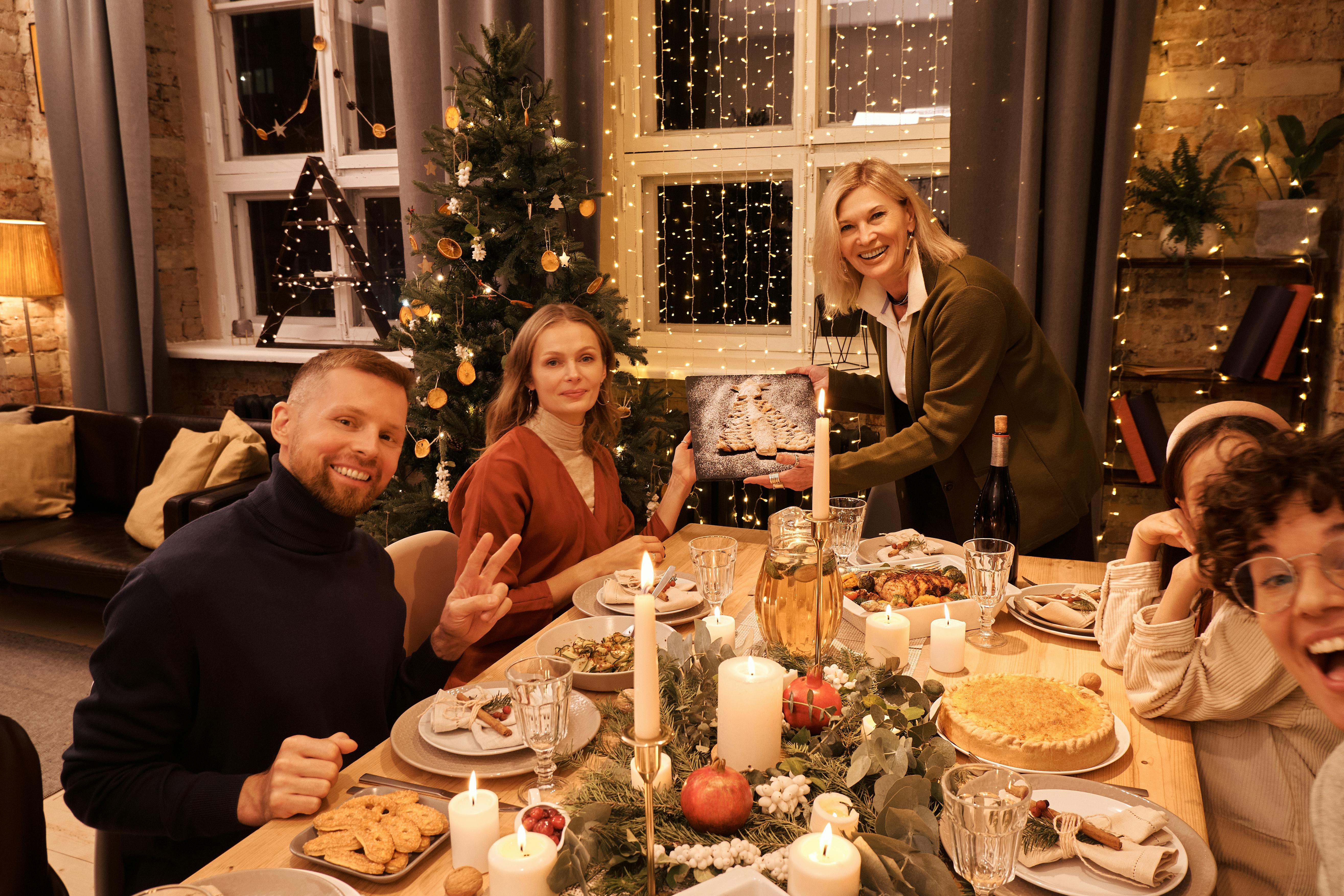 A happy family during dinner | Source: Pexels