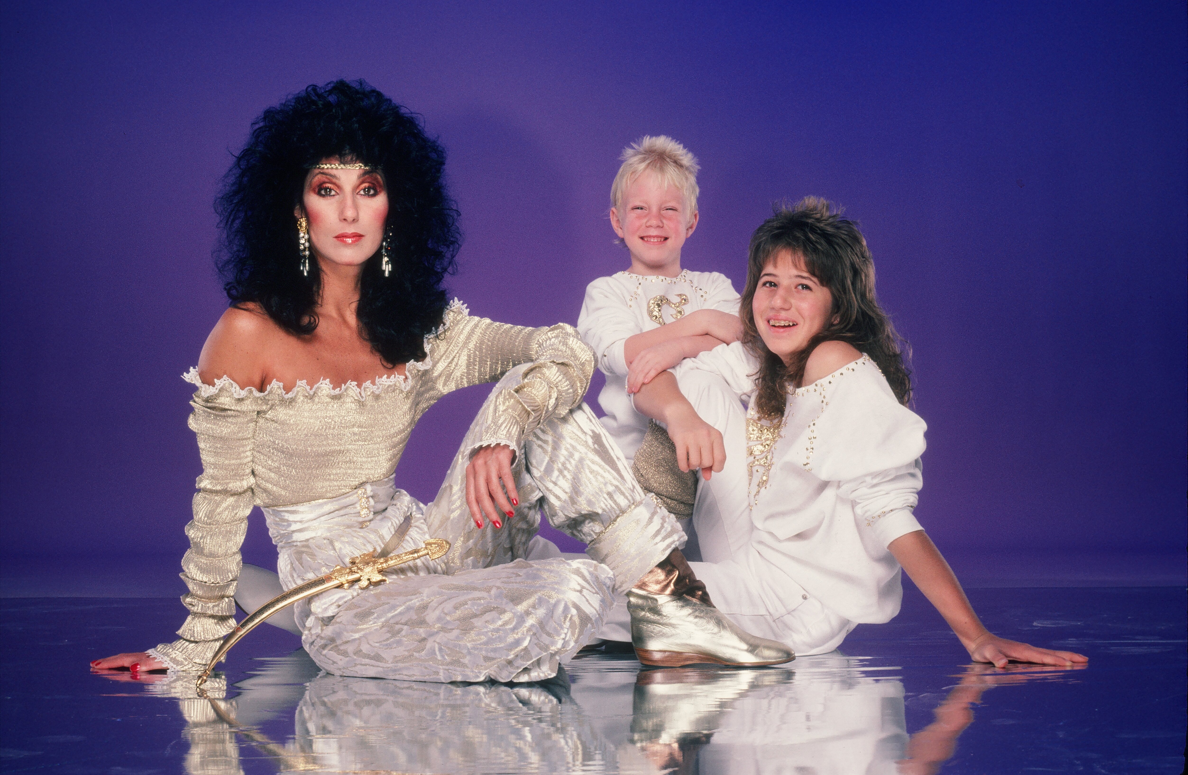Cher, daughter Chastity Bono, and son Elijah Blue Allman pose for a photo in June 1981 in Los Angeles, California | Source: Getty Images