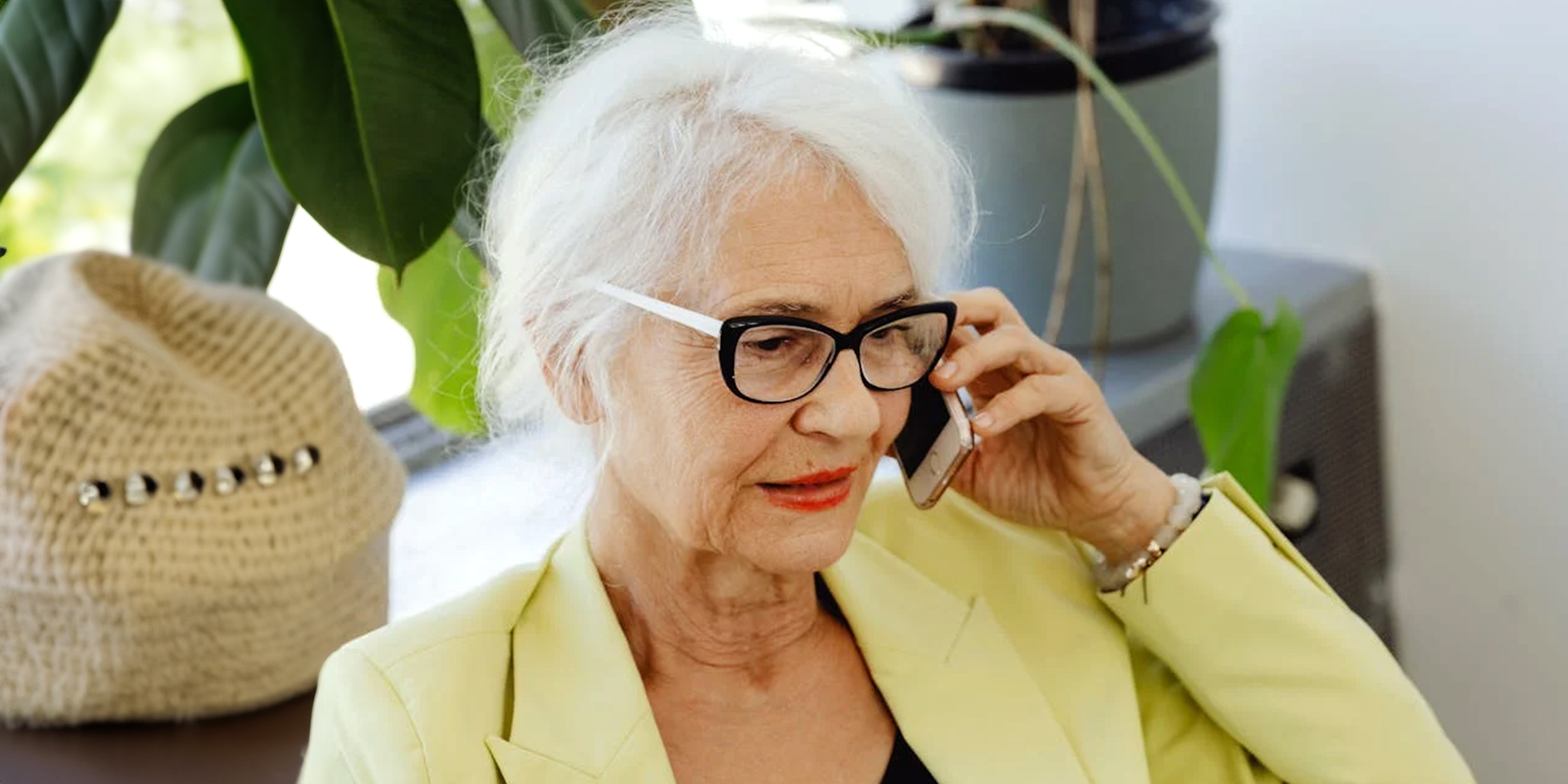 An elderly woman answering a cell phone call | Source: Pexels