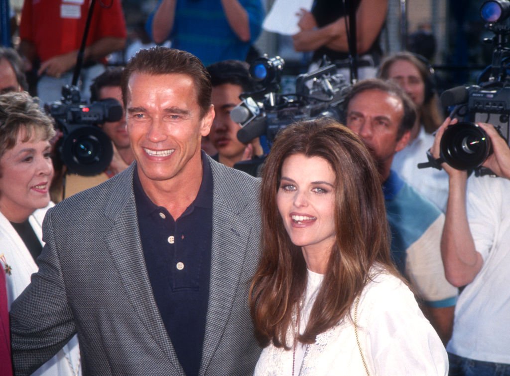 Actor Arnold Scharzenegger and his wife Maria Shriver on June 13, 1993 at the Mann Village Theater in Westwood, California. | Source: Getty Images