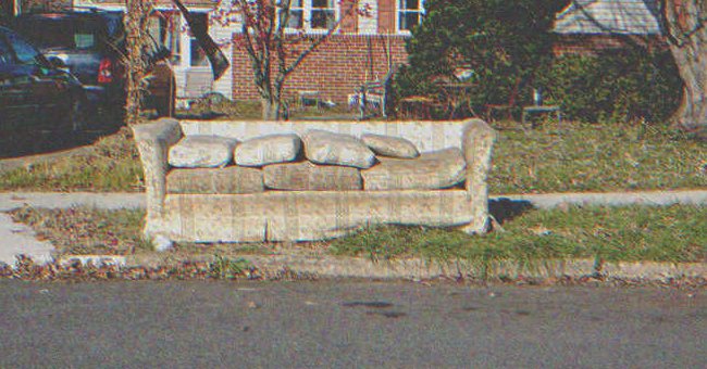 An old couch on the street | Source: Shutterstock
