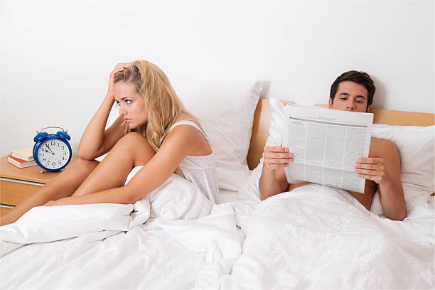 un couple qui s'ignore au lit | Photo : Getty Images