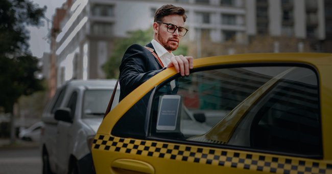A man about to enter a cab. | Photo: Shutterstock