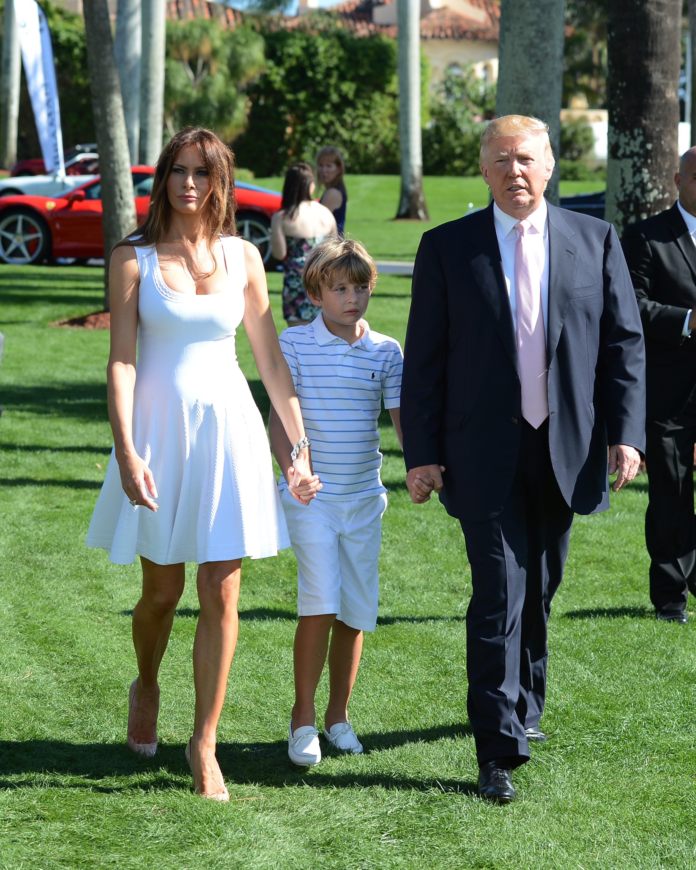 Donald, Melania, and Barron Trump at the Trump Invitational Grand Prix at Mar-a-Lago on January 6, 2013, in Palm Beach, Florida. | Source: Getty Images