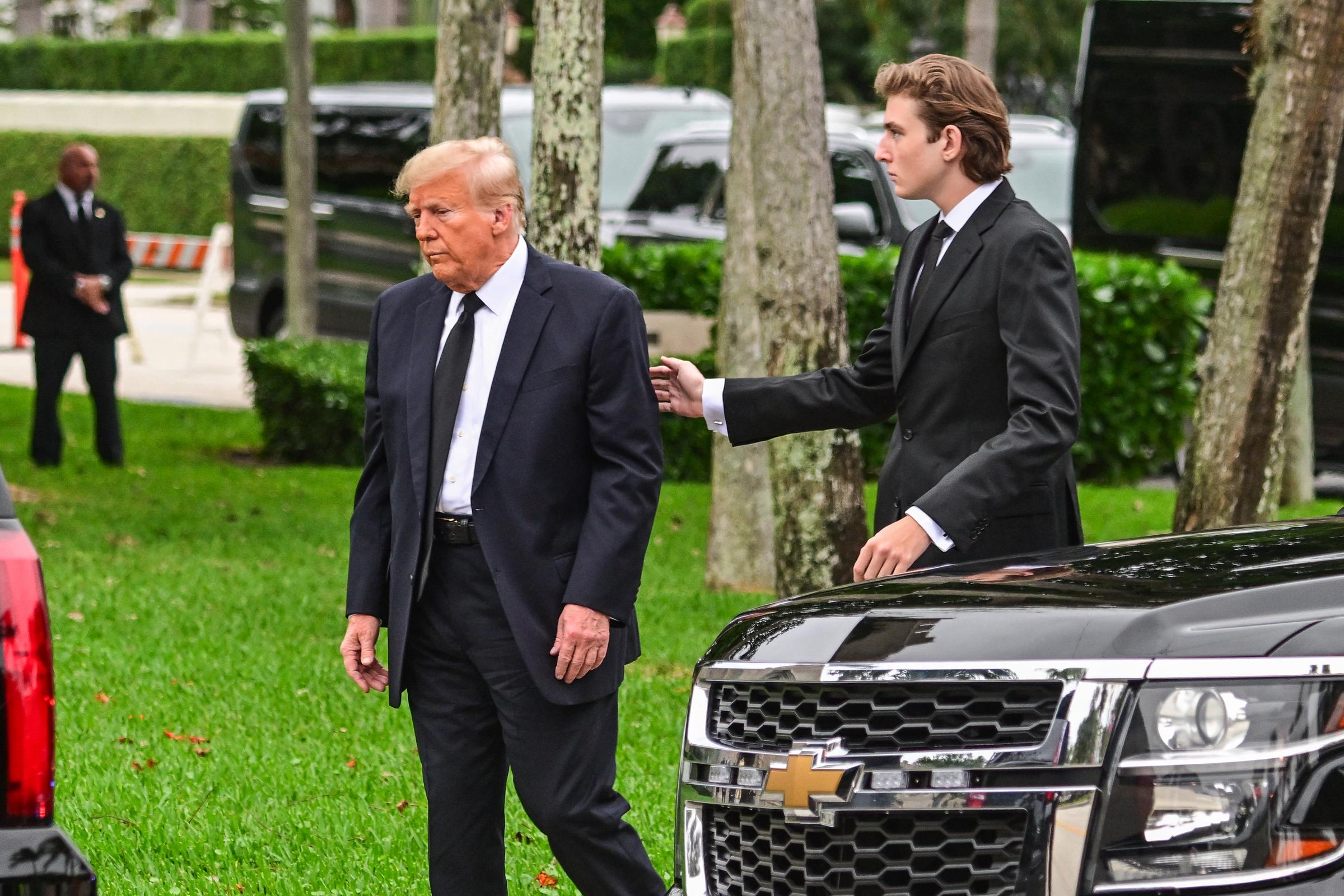 Donald and Barron Trump at the funeral of Melania Trump's mother, Amalija Knavs, in Palm Beach, Florida on January 18, 2024. | Source: Getty Images