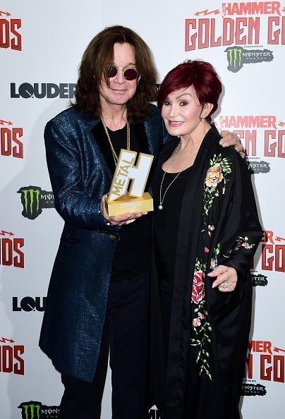 Ozzy Osbourne with his Golden God award and wife Sharon Osbourne in the press room at the Metal Hammer Golden Gods Awards 2018 | Photo: Getty Images