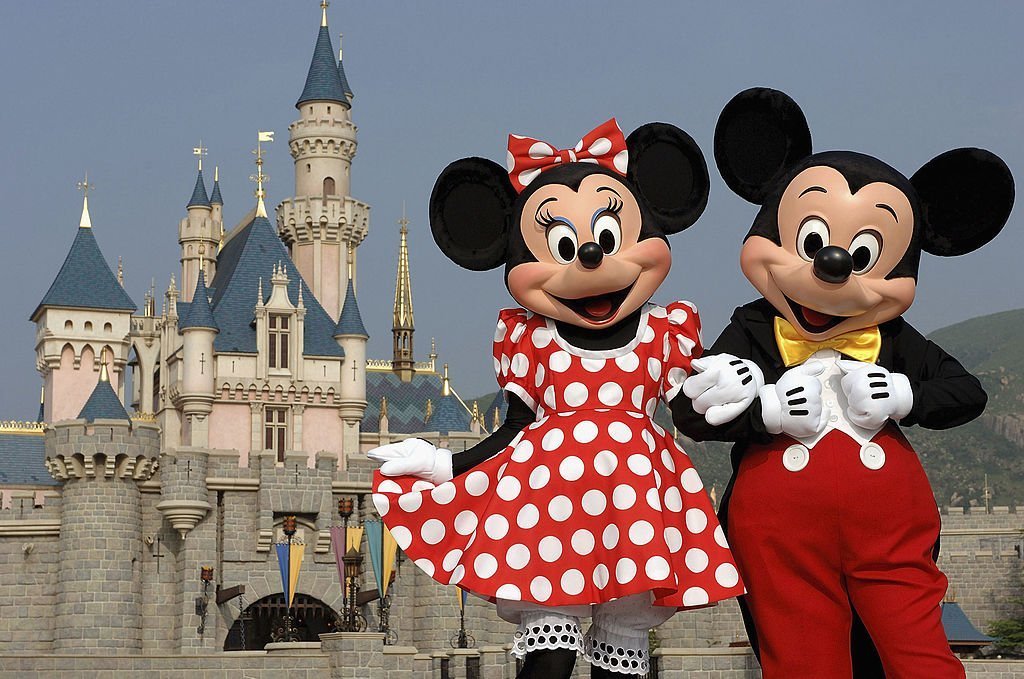  Mickey and Minnie Mouse are seen in front of the Sleeping Beauty Castle at the new Disneyland Park on September 1, 2005 in Hong Kong.  | Getty Images