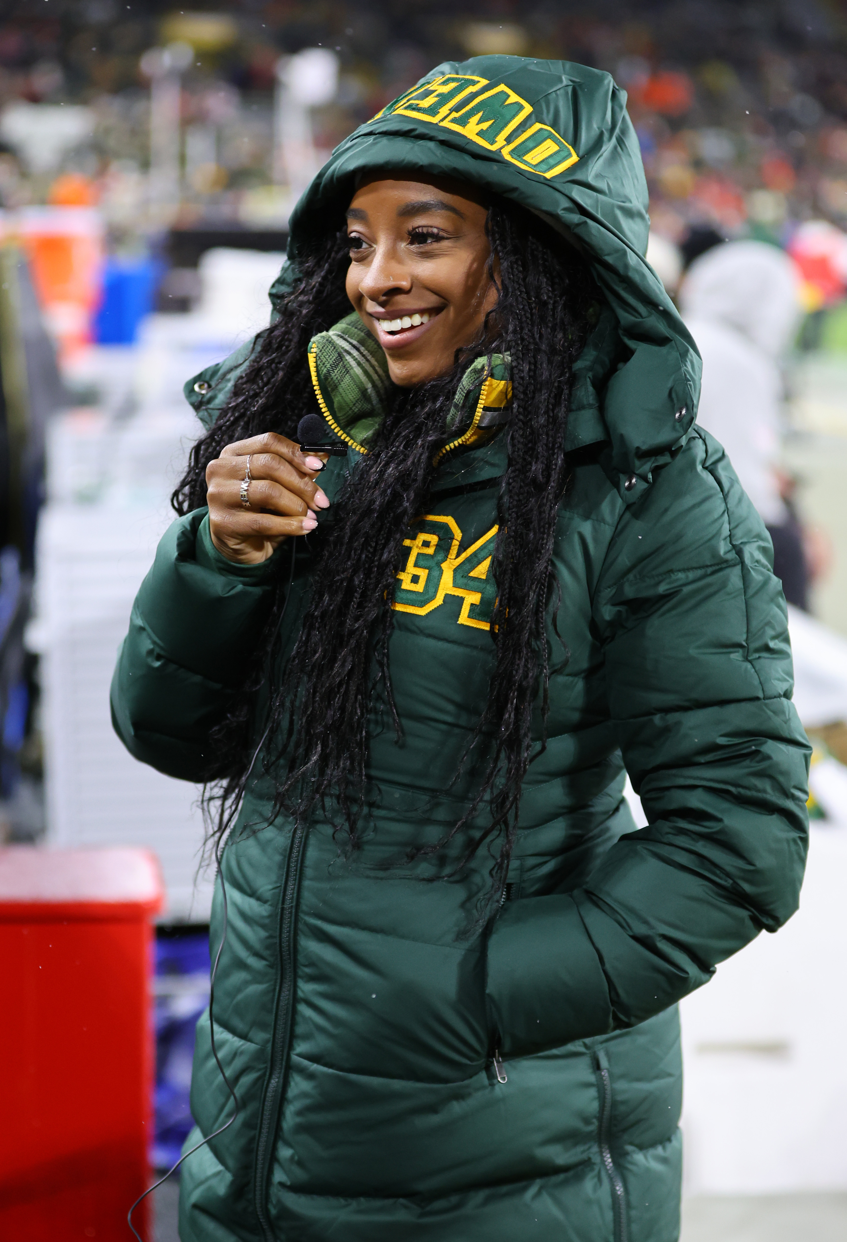 Simone Biles looks at the game between the Kansas City Chiefs and the Green Bay Packers at Lambeau Field on December 3, 2023, in Green Bay, Wisconsin | Source: Getty Images