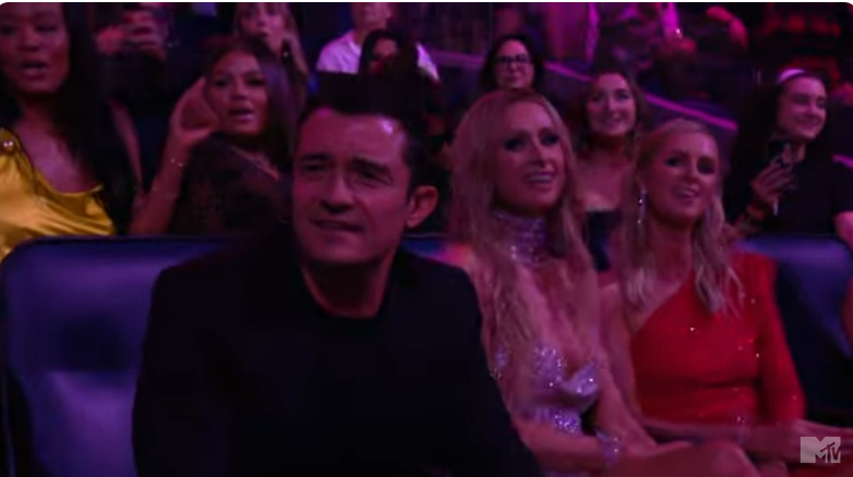 Orlando Bloom watches Katy Perry perform at the MTV VMAs, from a YouTube video dated September 12, 2024 | Source: Youtube/@MTV