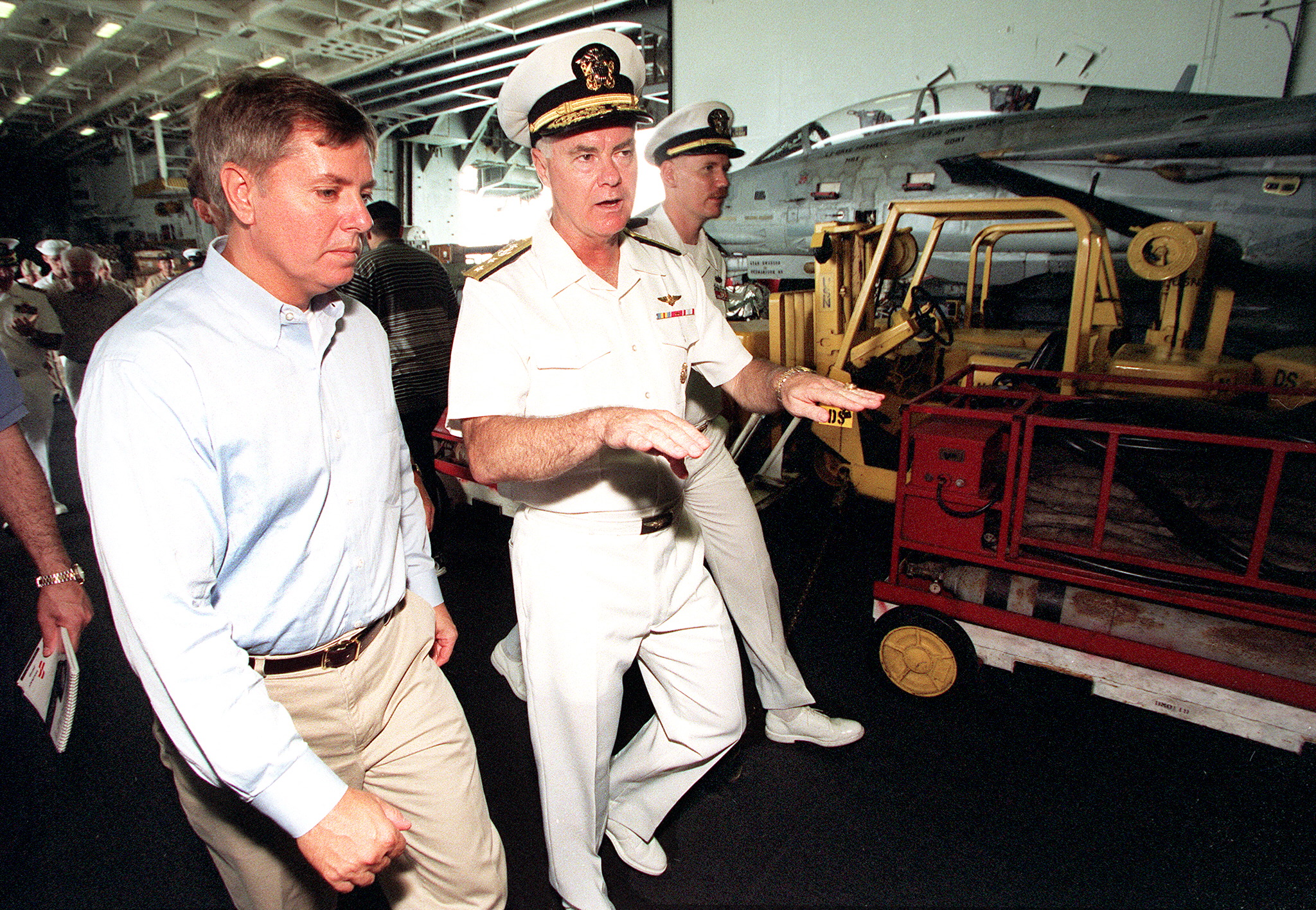 Then-Rep. Lindsey Graham tours the USS Kitty Hawk during a congressional visit in 1999. His long association with the U.S. military later shaped his work in the Senate, where he became one of Congress' most influential voices on national security and foreign policy. | Source: Getty Images