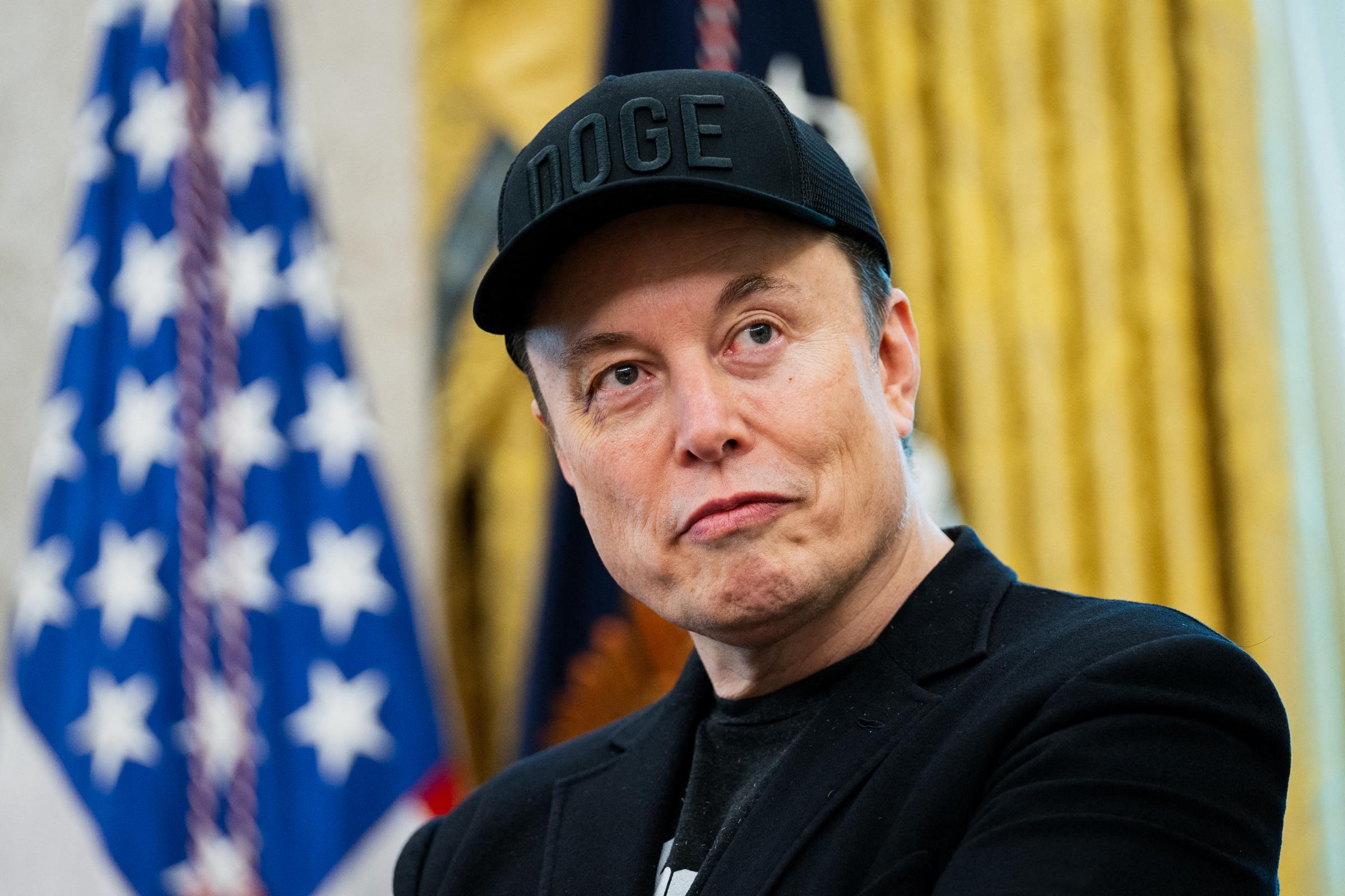 Elon Musk looks on during a news conference with US President Donald Trump in the Oval Office of the White House on May 30, 2025, in Washington, DC. | Source: Getty Images