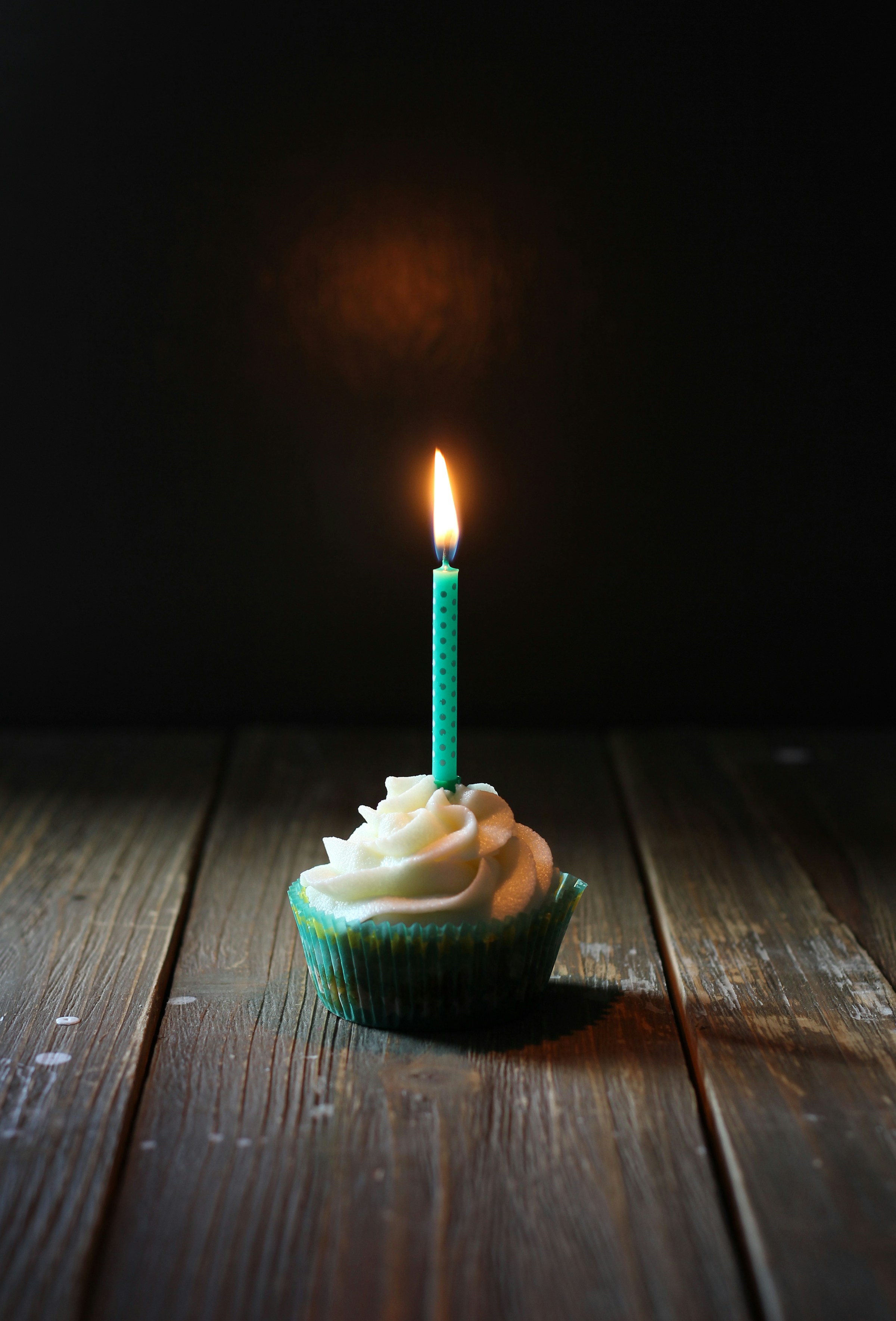 A cupcake with a candle | Source: Unsplash