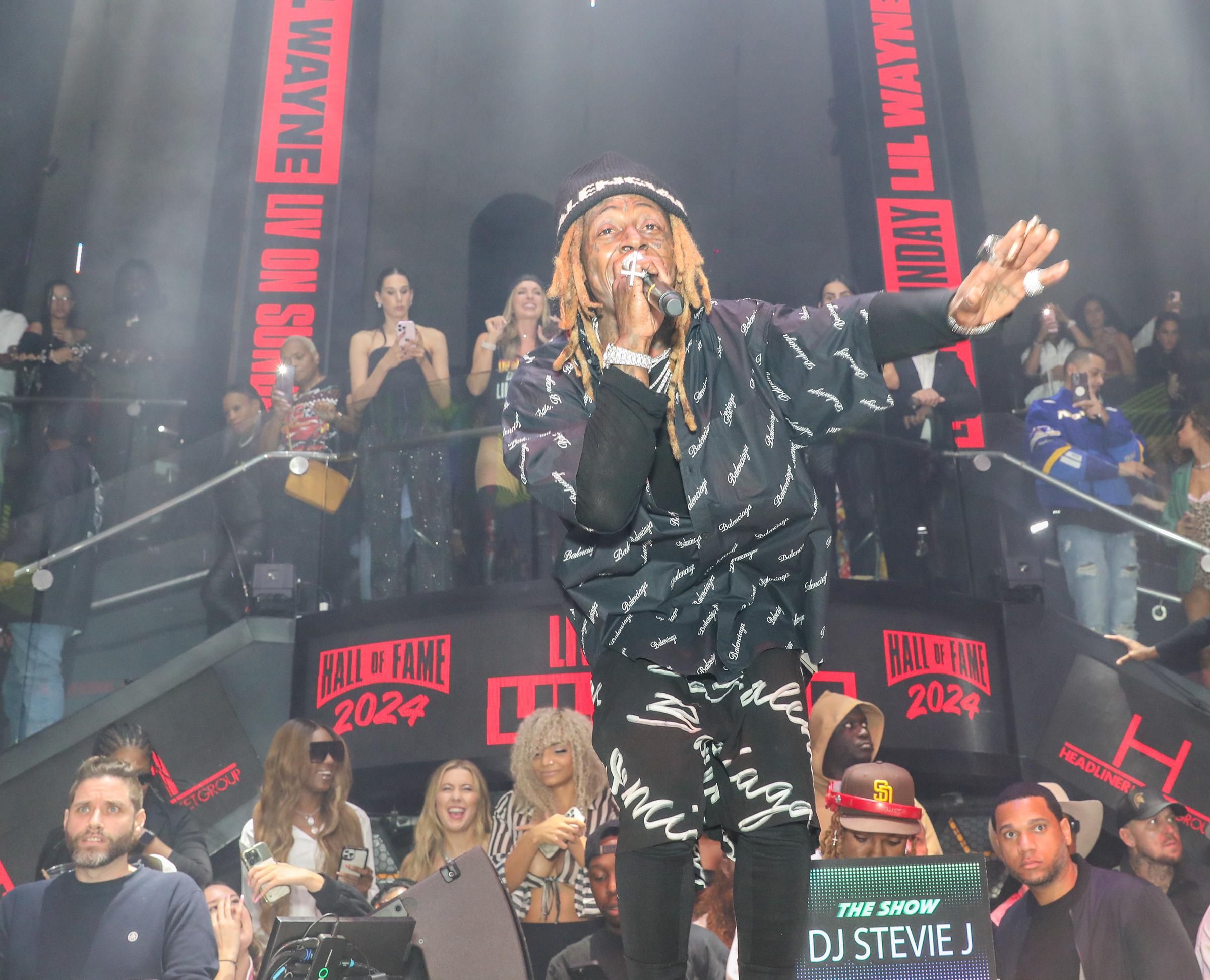 Lil Wayne performing at LIV Nightclub in Miami Beach, Florida on December 8, 2024. | Source: Getty Images