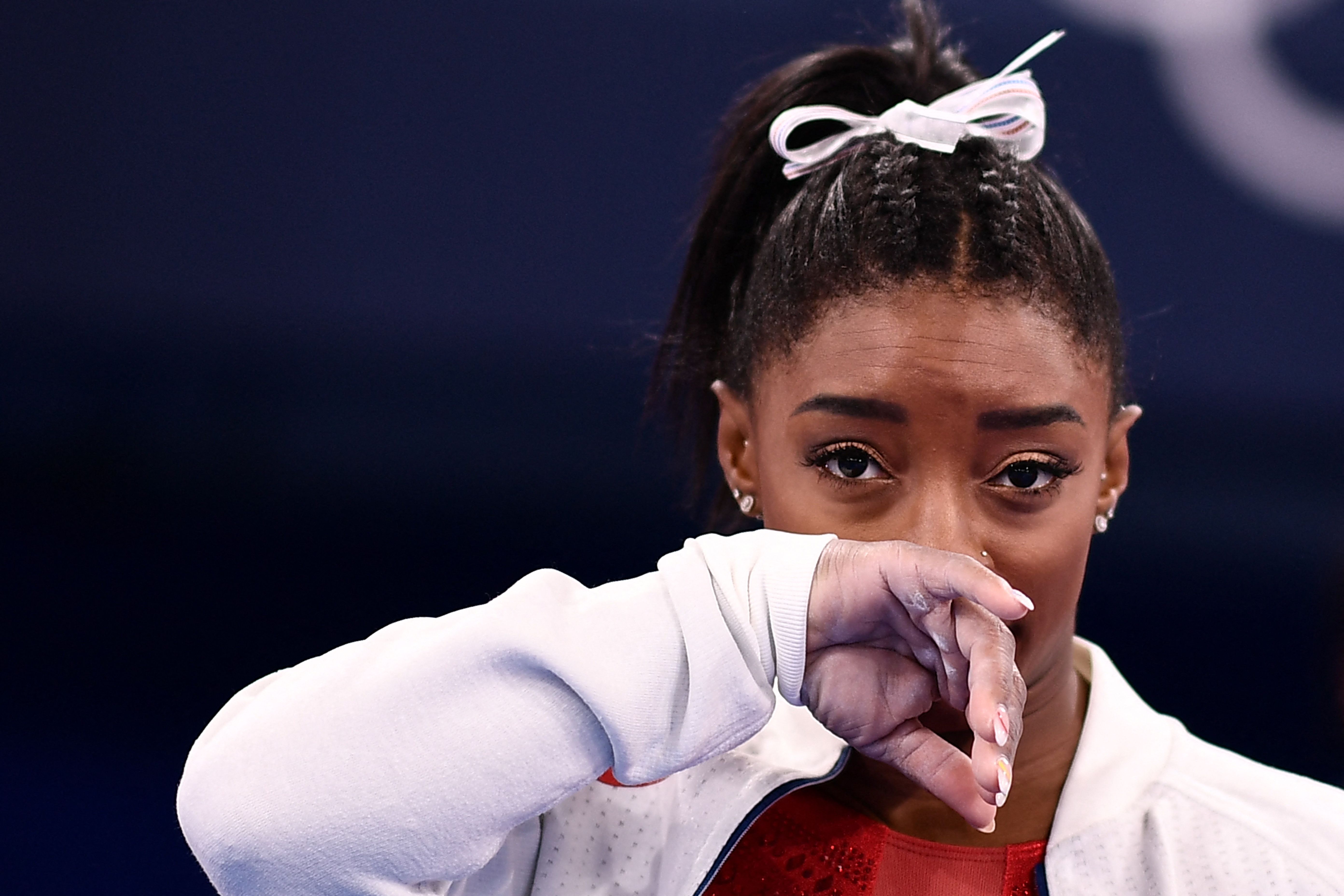 Simone Biles gestures during the Tokyo 2020 Olympic Games on July 27, 2021, in Tokyo, Japan. | Source: Getty Images