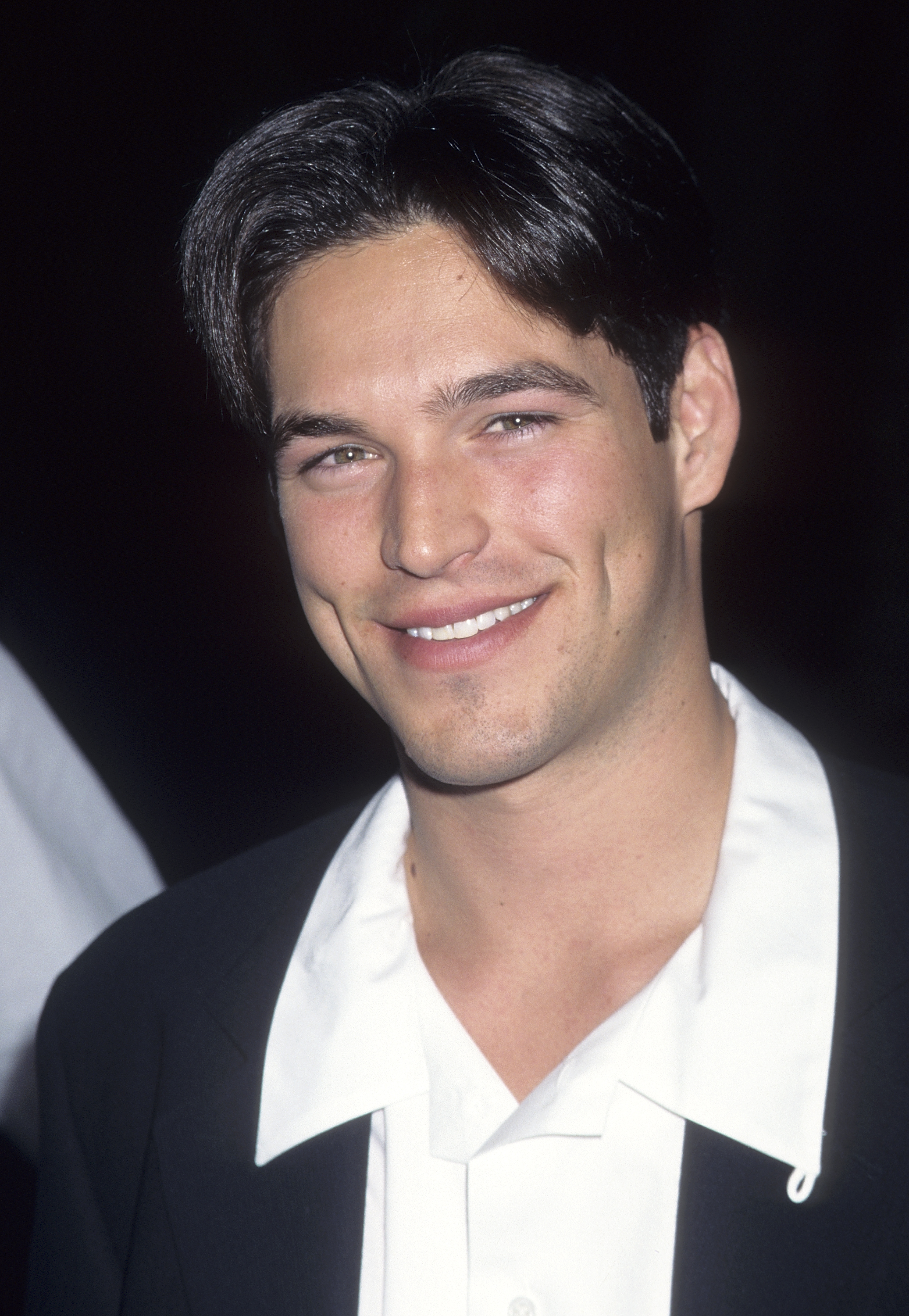 The '90s Hollywood heartthrob at David Hasselhoff's holiday party for the cast of "Baywatch" and "Baywatch Nights" on December 15, 1995, in Universal City, California. | Source: Getty Images