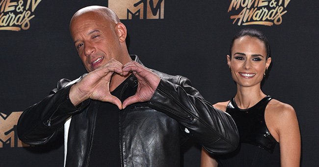 Vin Diesel and Jordana Brewster posing in the press room at the 2017 MTV Movie and TV Awards at The Shrine Auditorium in Los Angeles, California | Photo: C Flanigan/Getty Images
