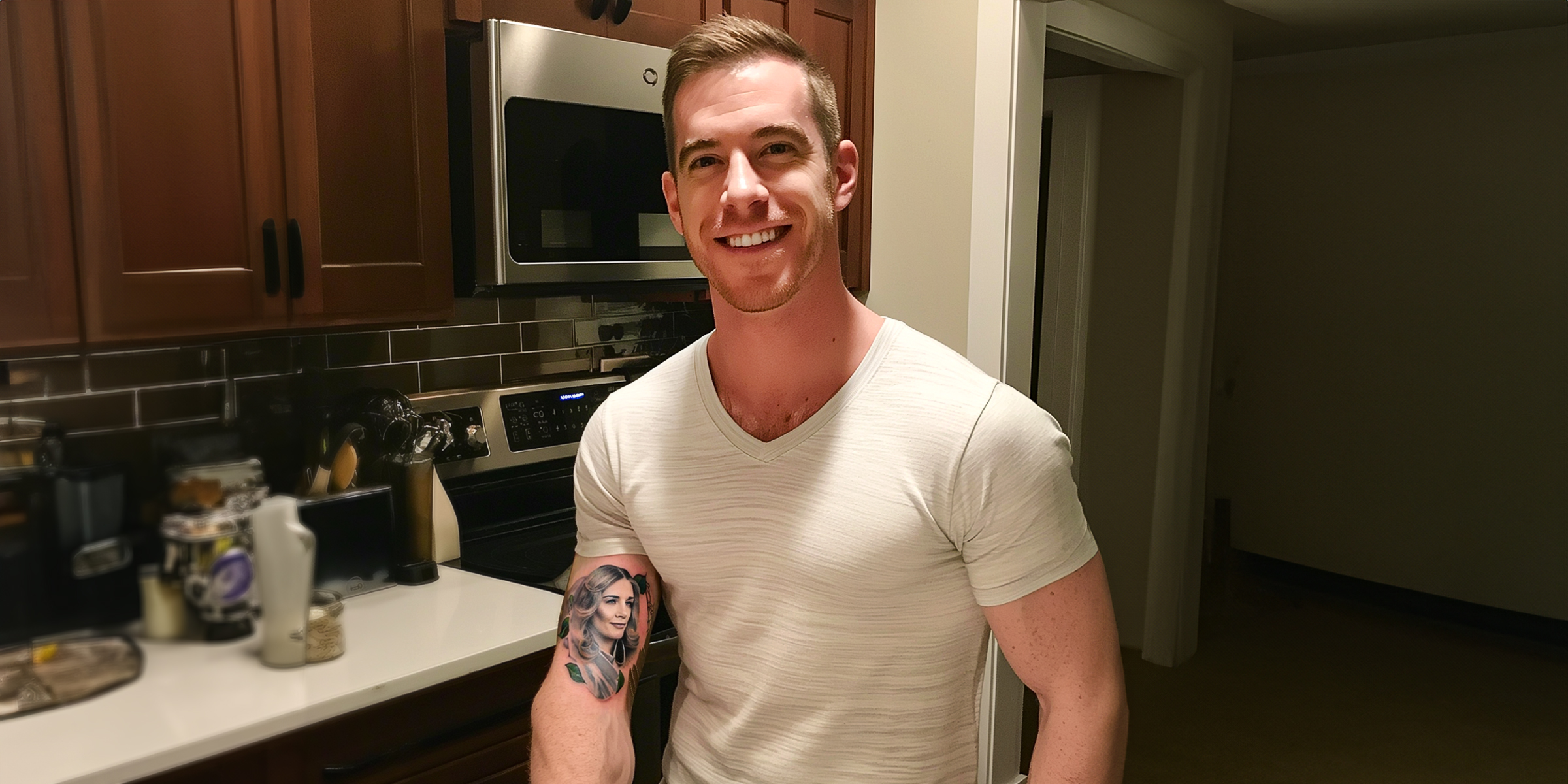 Man with a woman's face tattooed on his upper arm | Source: Amomama