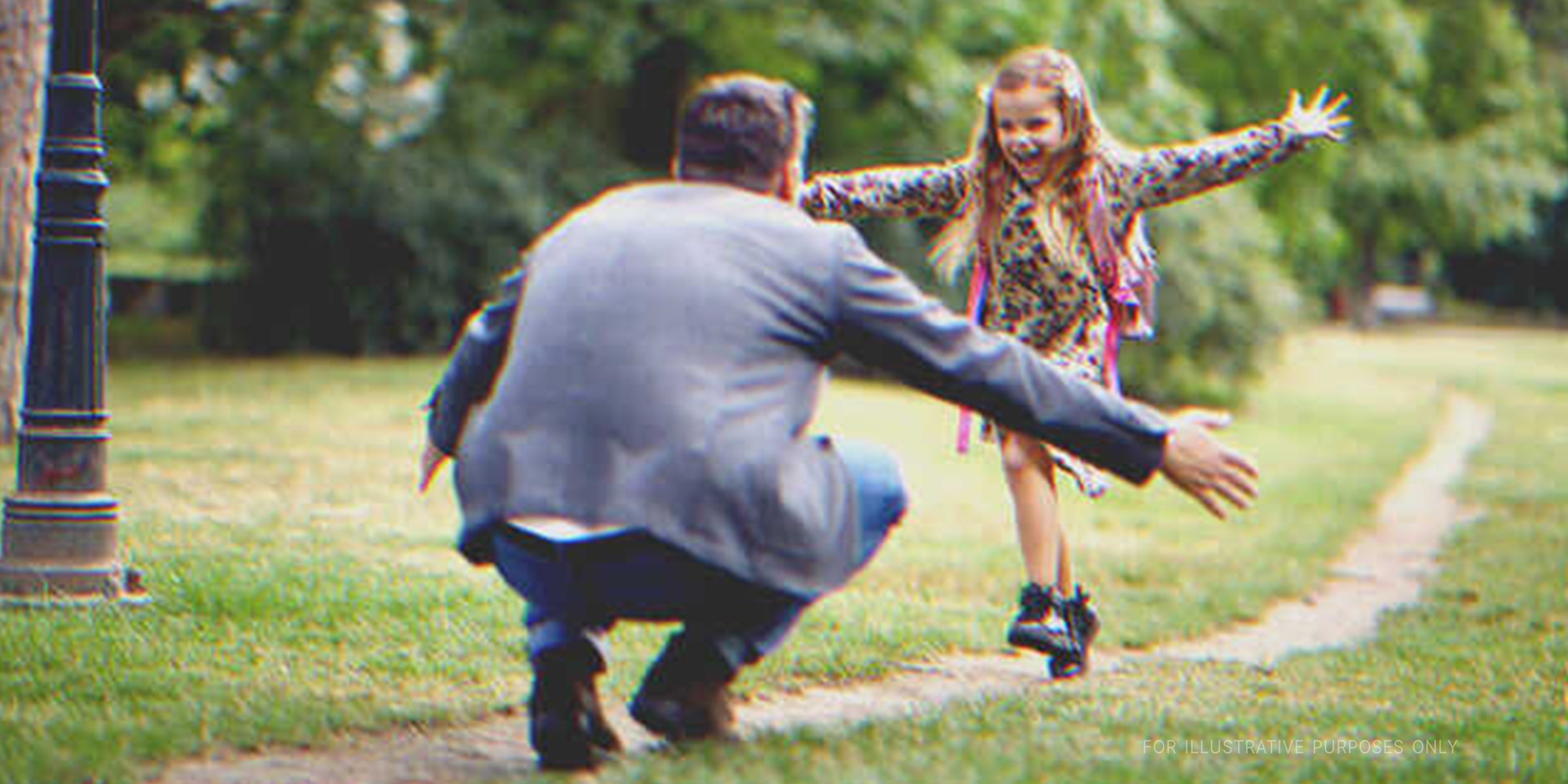 A happy little girl running towards a man | Source: Shutterstock
