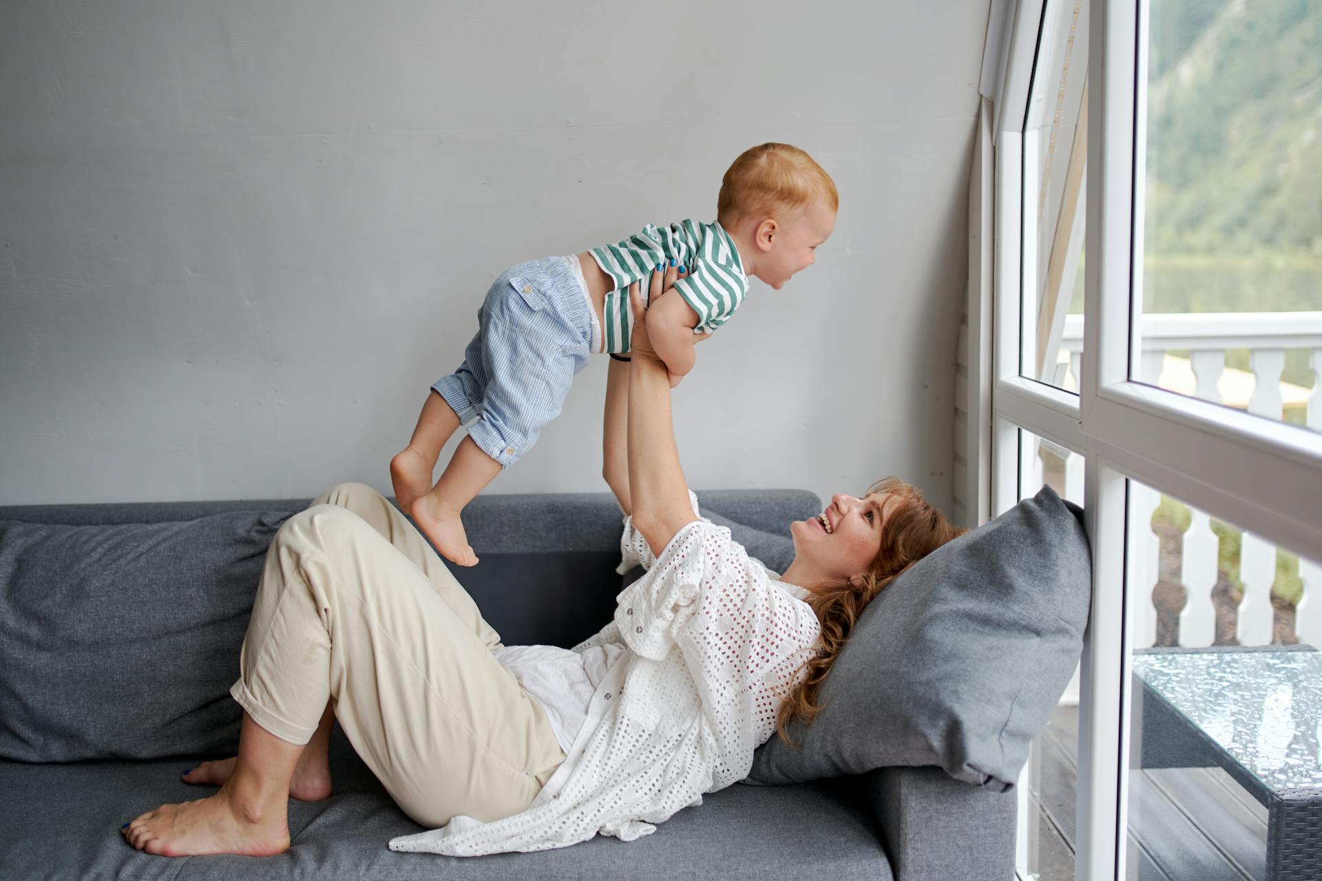 Cheerful woman with a little boy | Source: Pexels