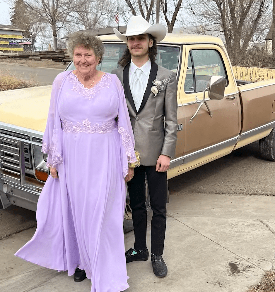  Dakota Wollan and his grandmother, Madeline Miller in front of his truck.| Source: facebook.com/KFYR-TV