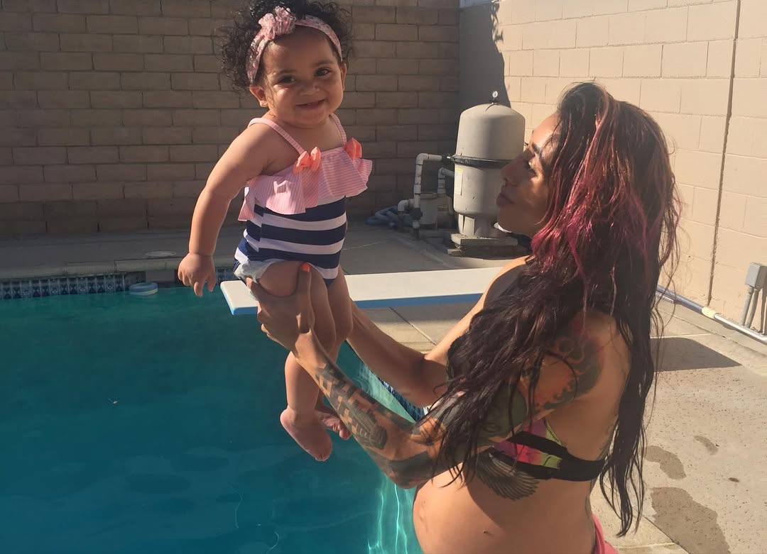 Soraya Love pictured holding Elleven Broadus, dated August 2023 | Source: Instagram/sorayaspanish