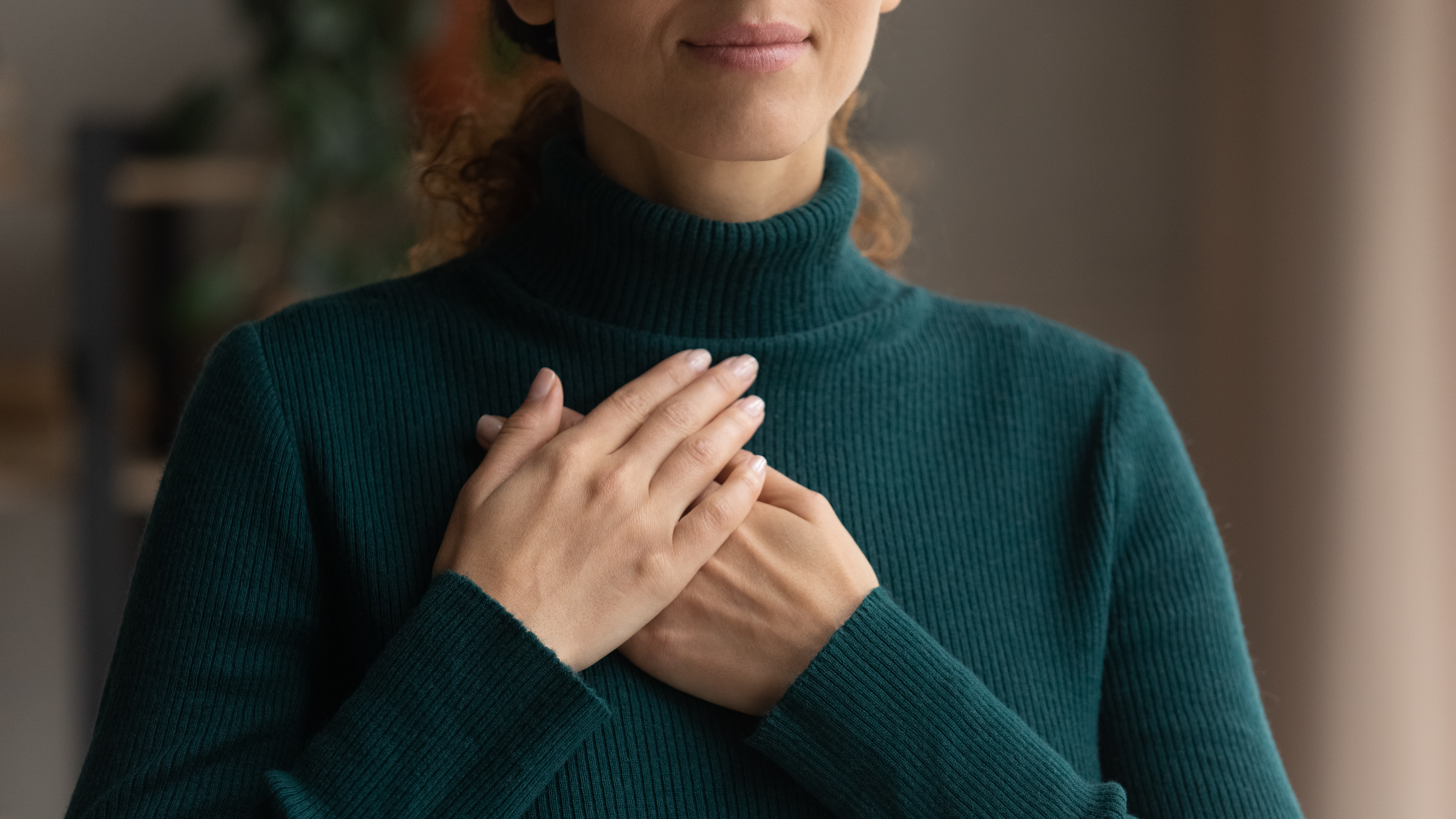 A young woman feeling hopeful | Source: Shutterstock